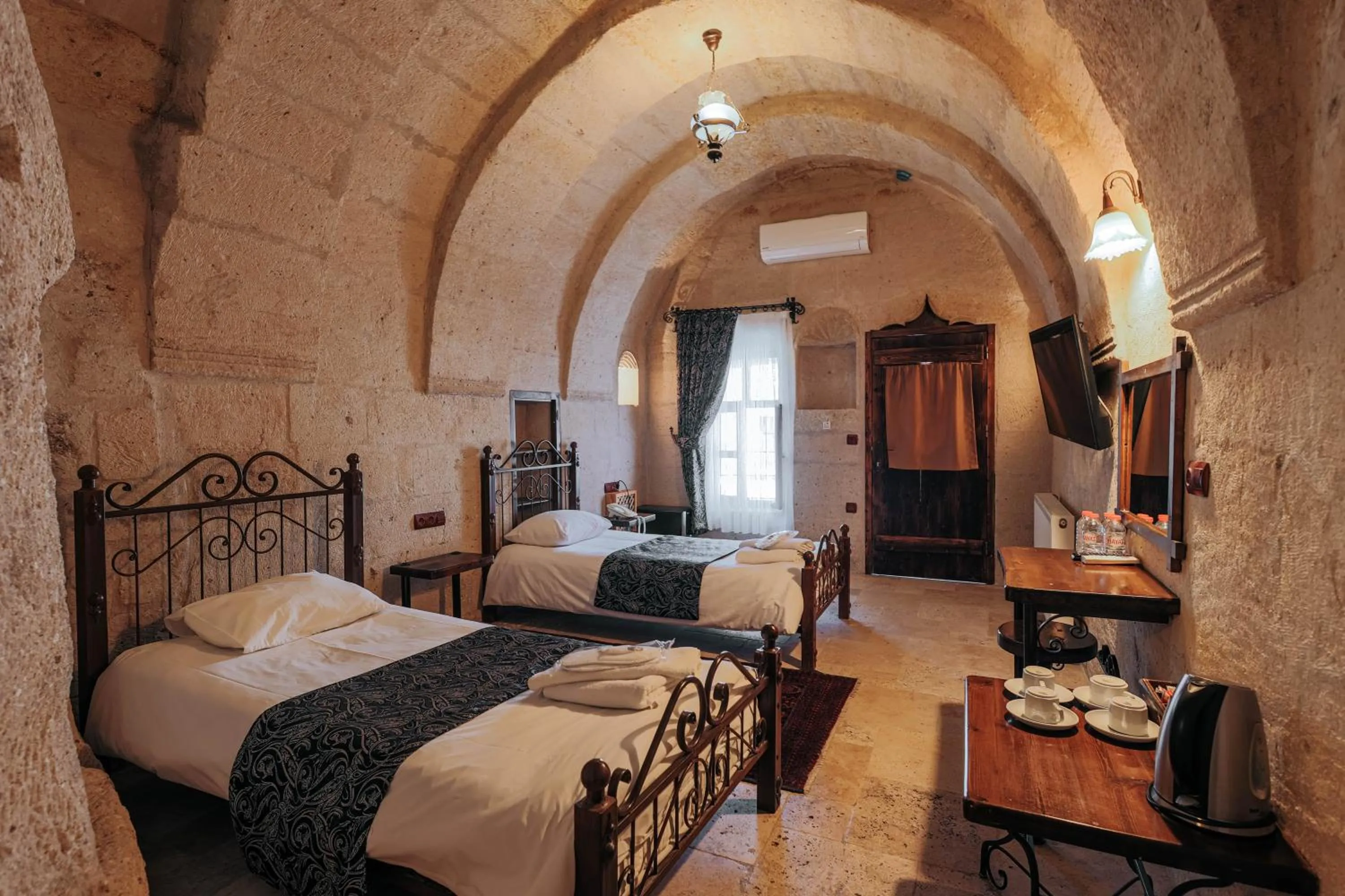 Bed in Century Cave Hotel