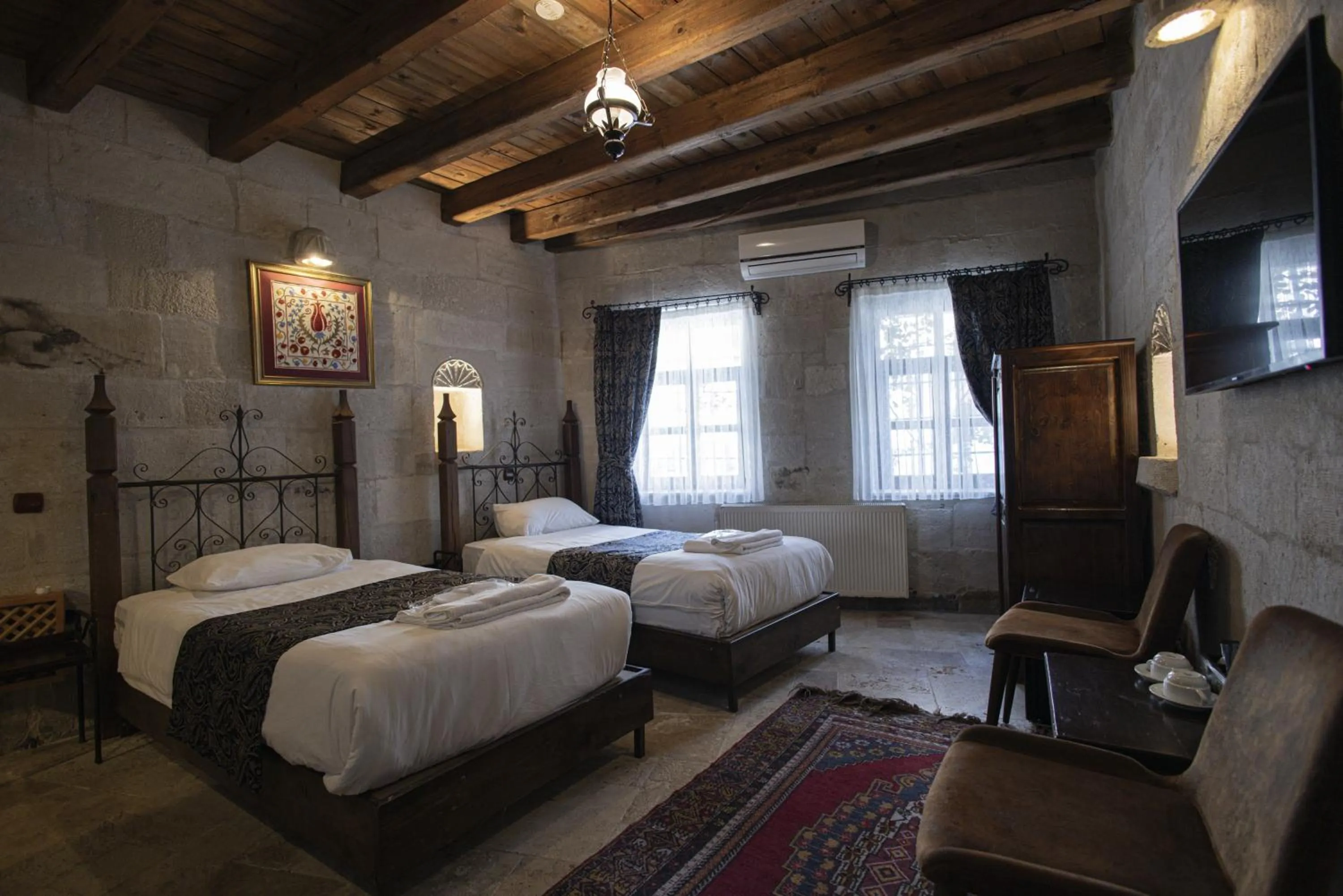 Bed in Century Cave Hotel