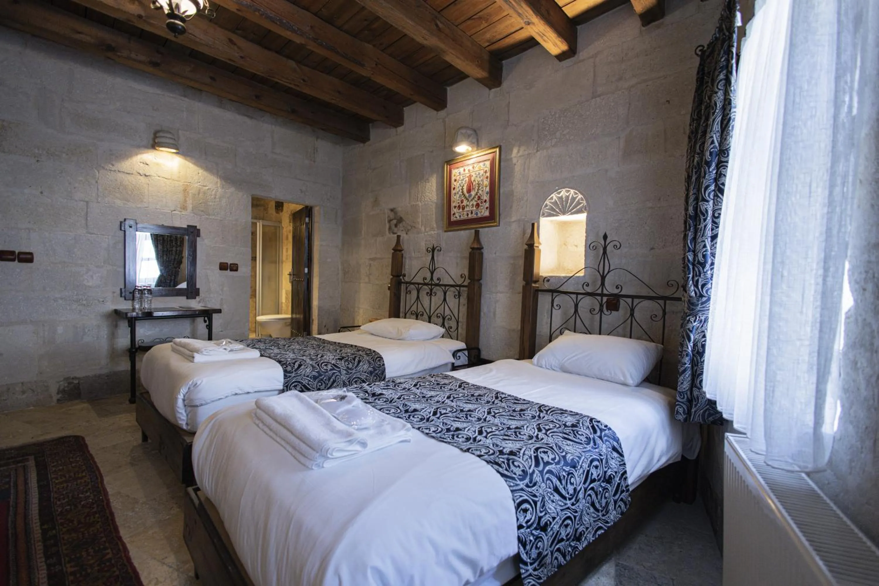 Bed in Century Cave Hotel