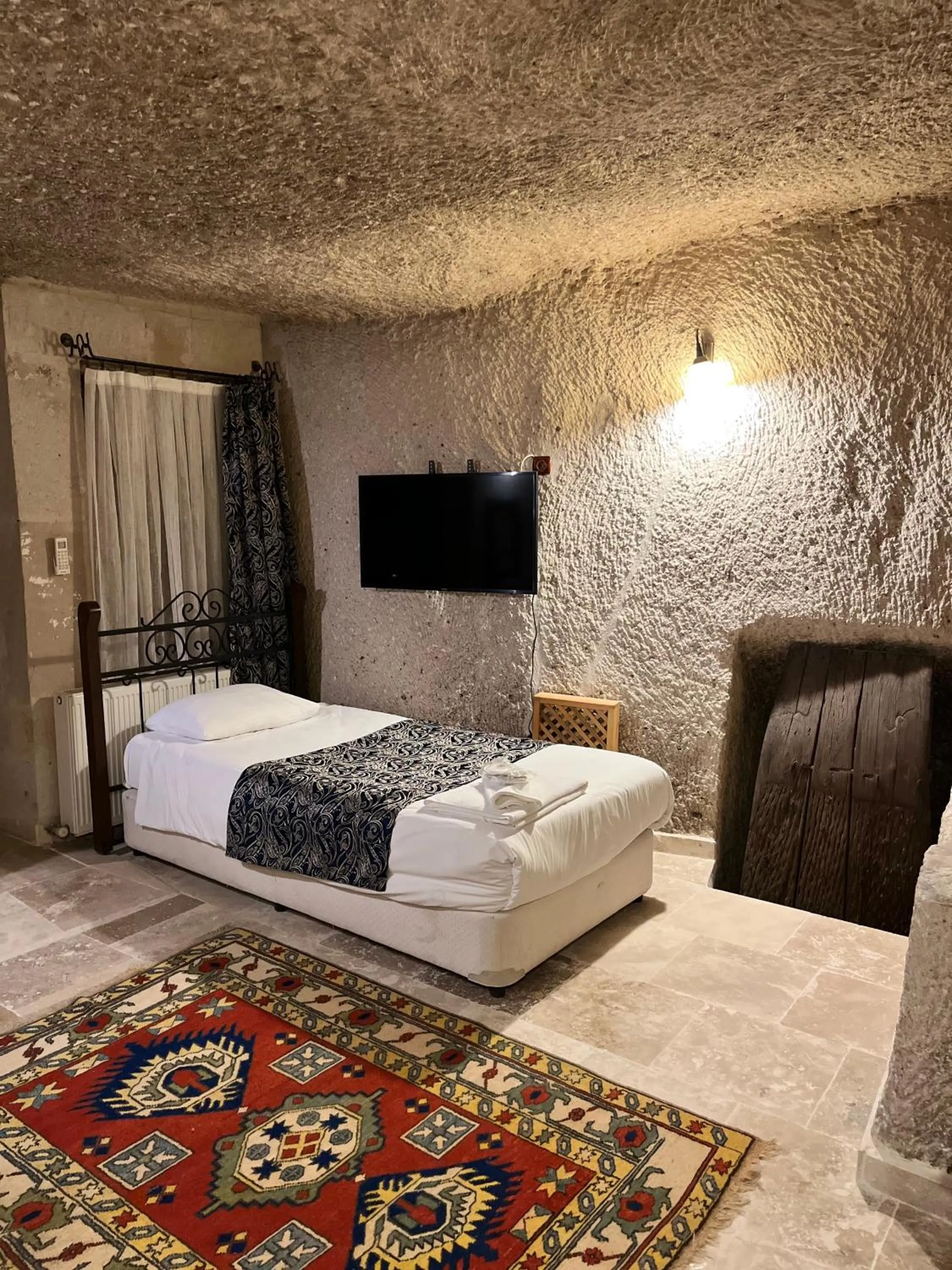 Bed in Century Cave Hotel