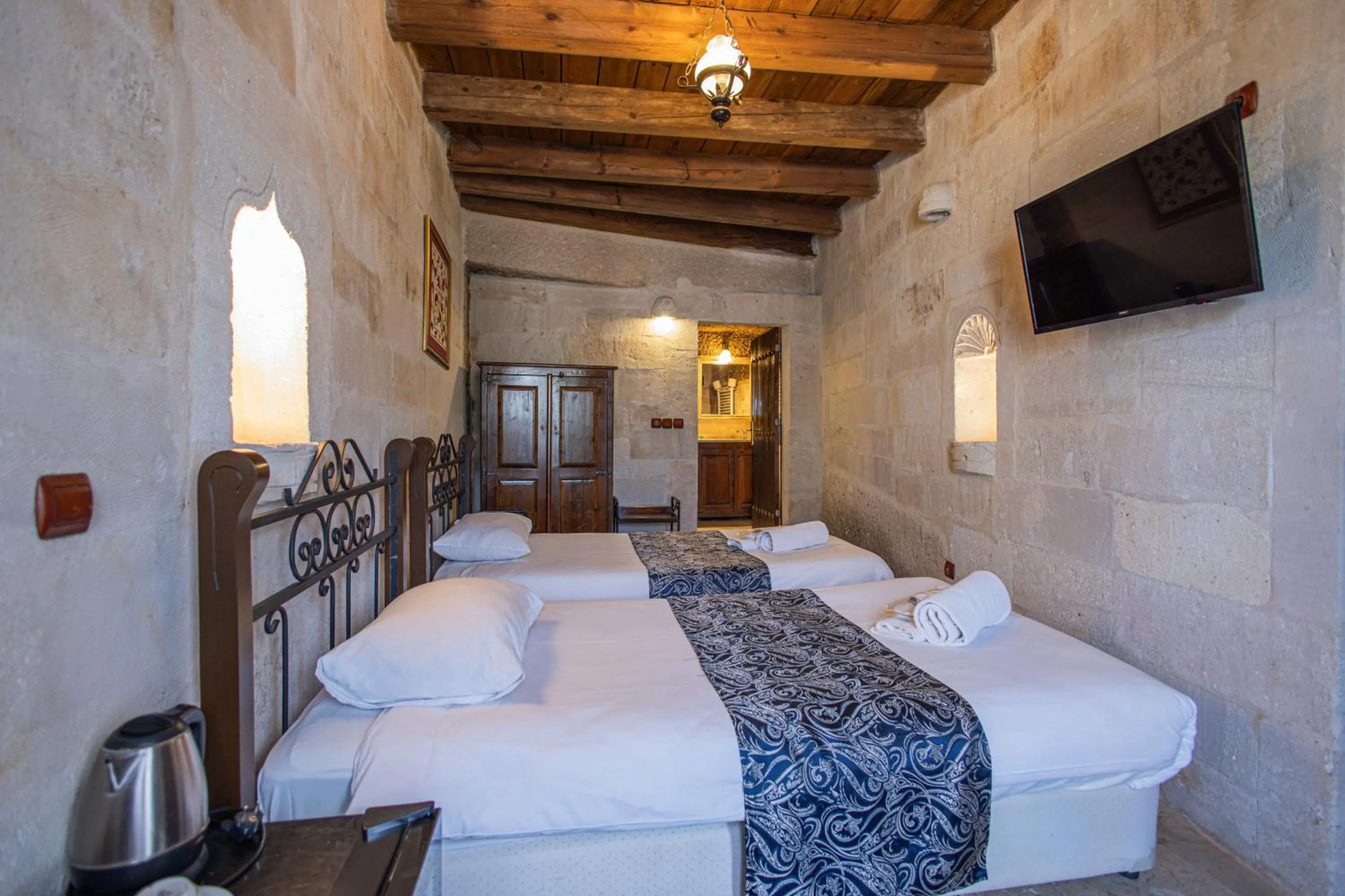 Bed in Century Cave Hotel