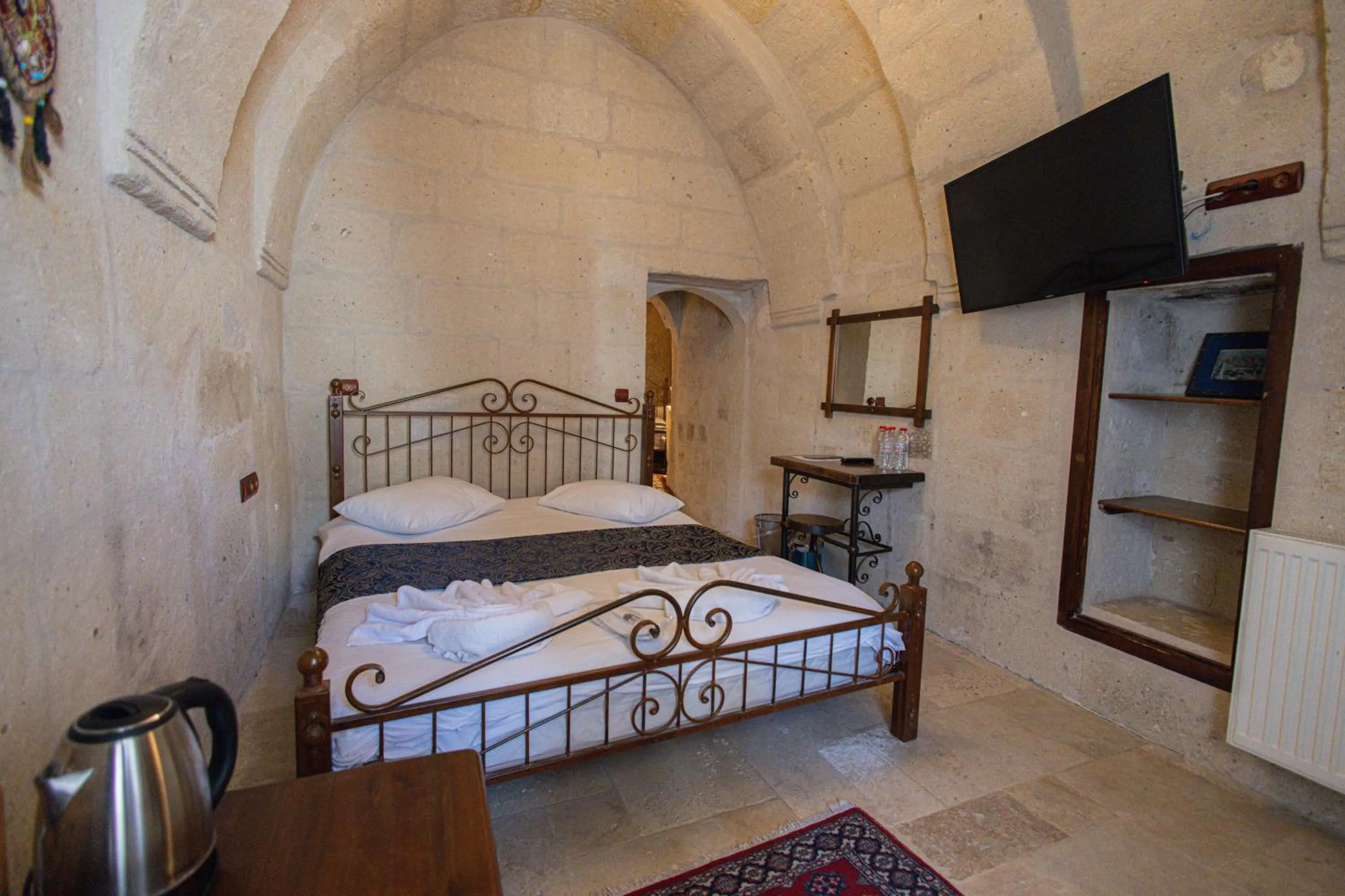 Bed in Century Cave Hotel