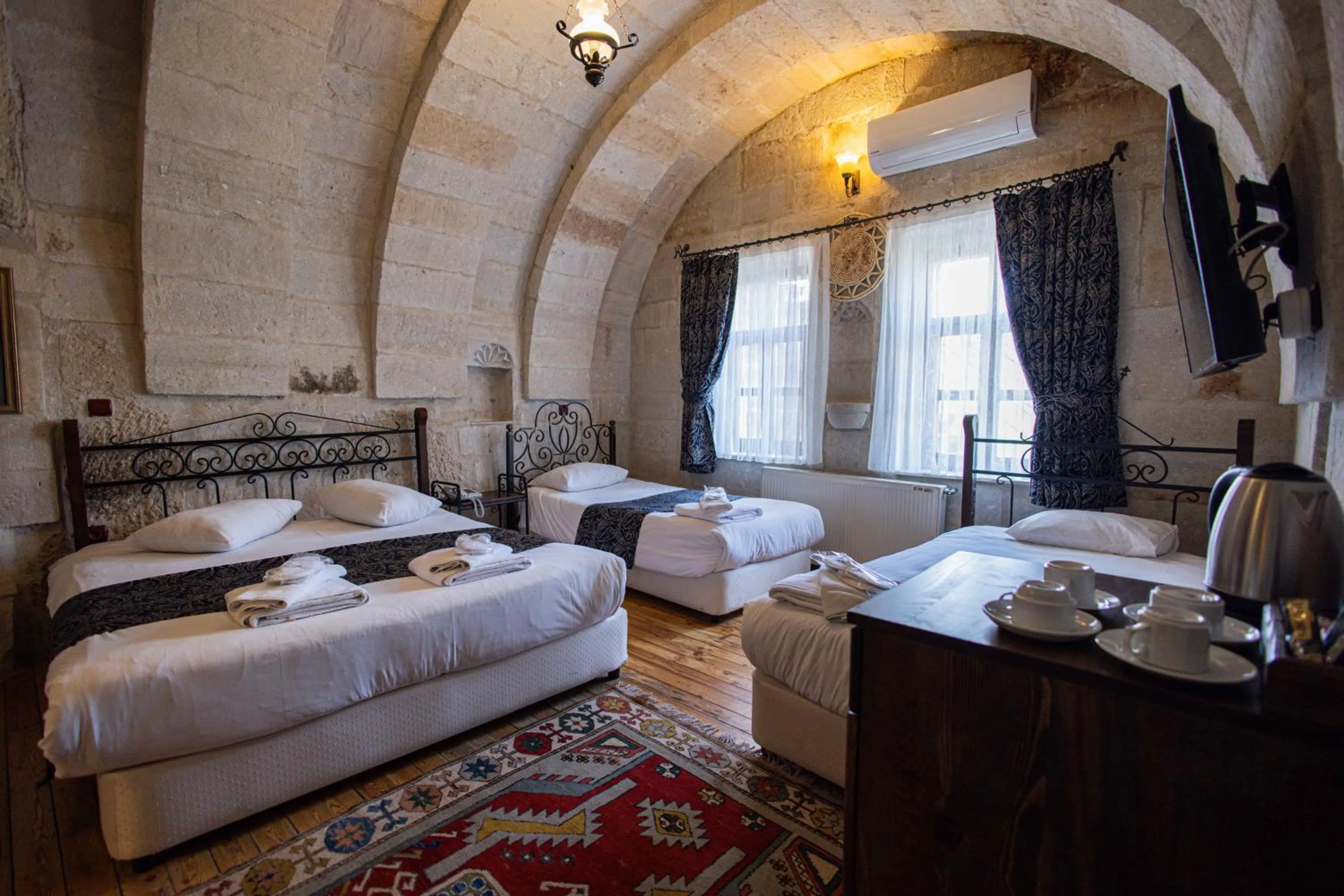 Bed in Century Cave Hotel