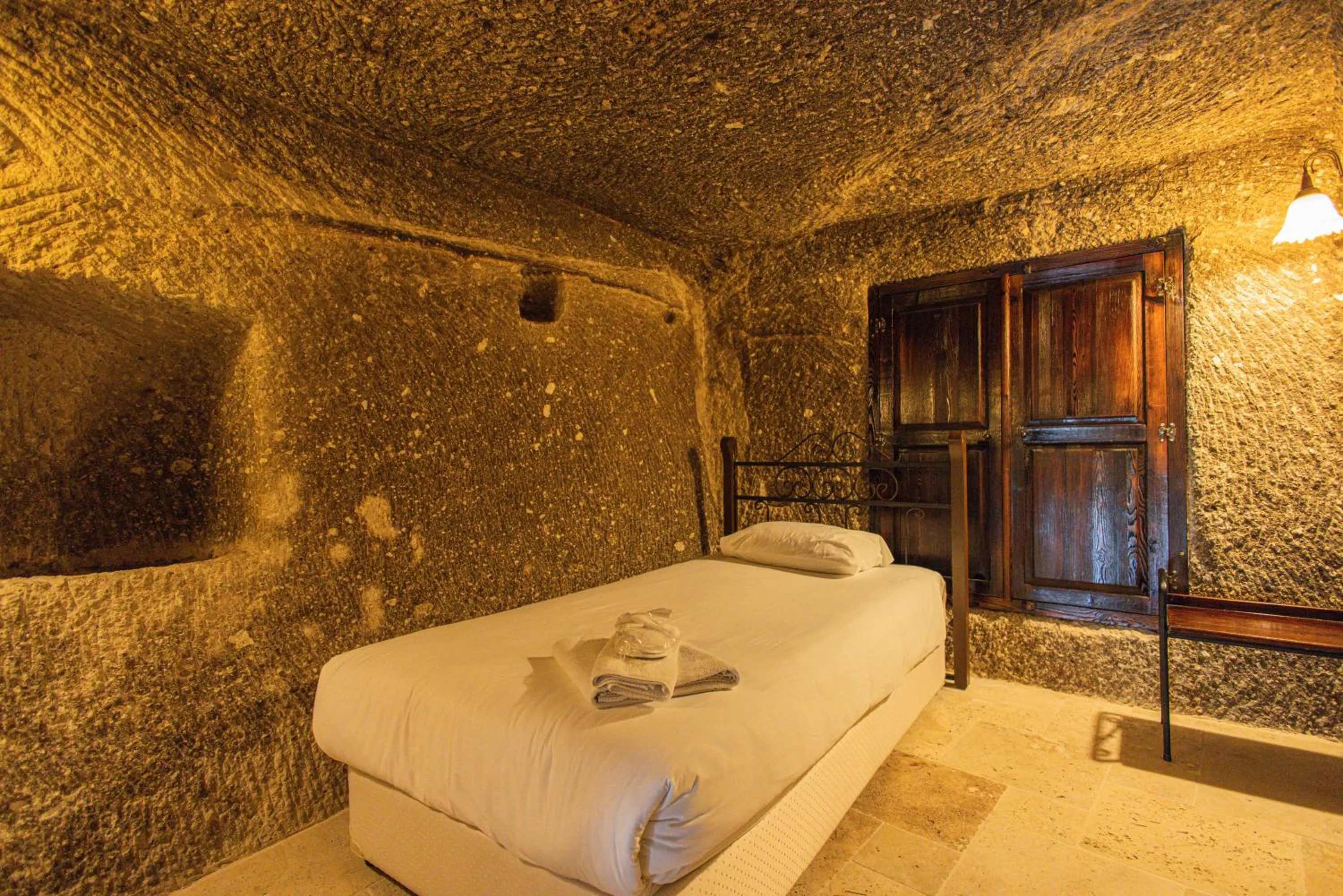 Bed in Century Cave Hotel