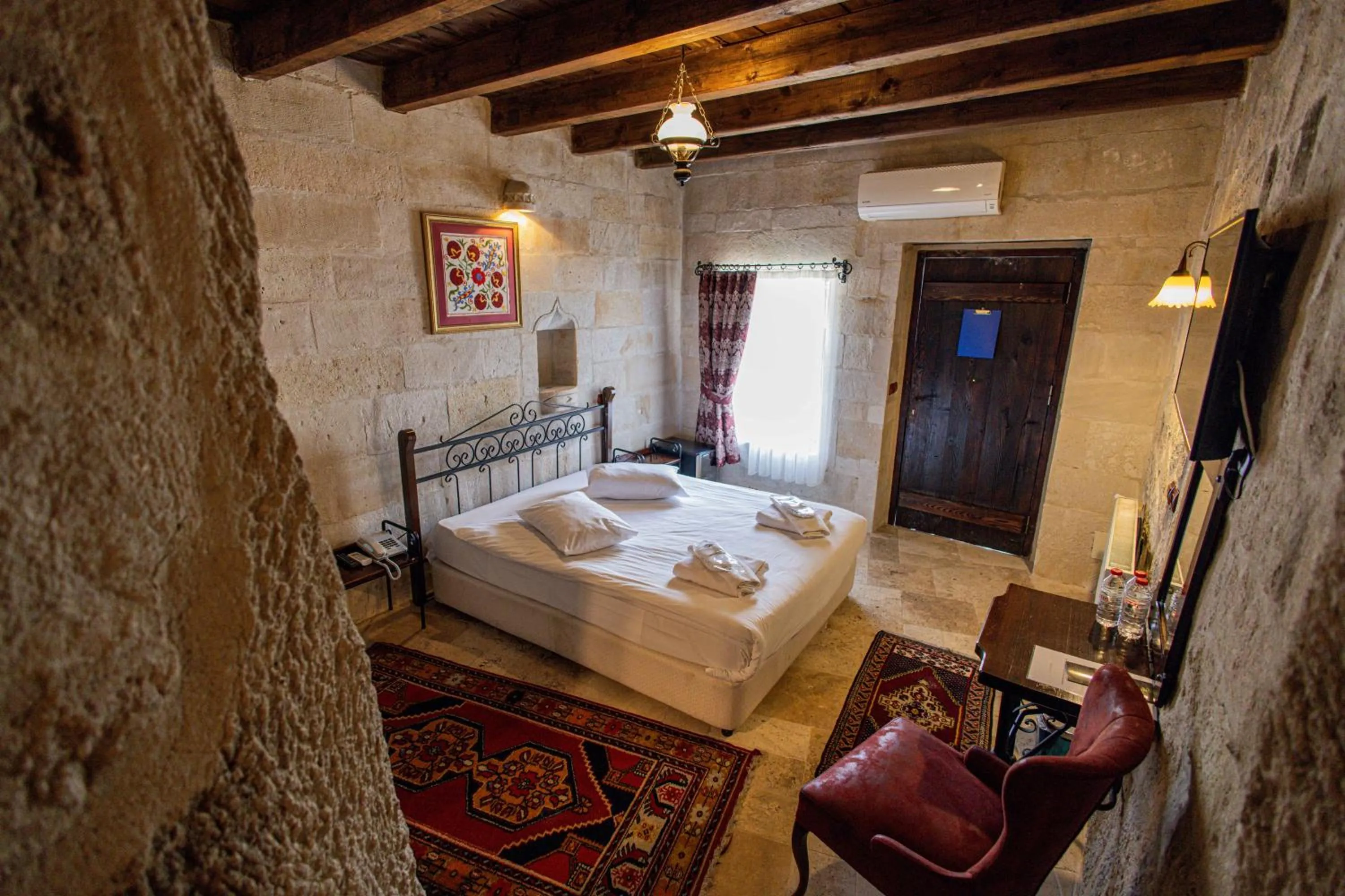 Bed in Century Cave Hotel