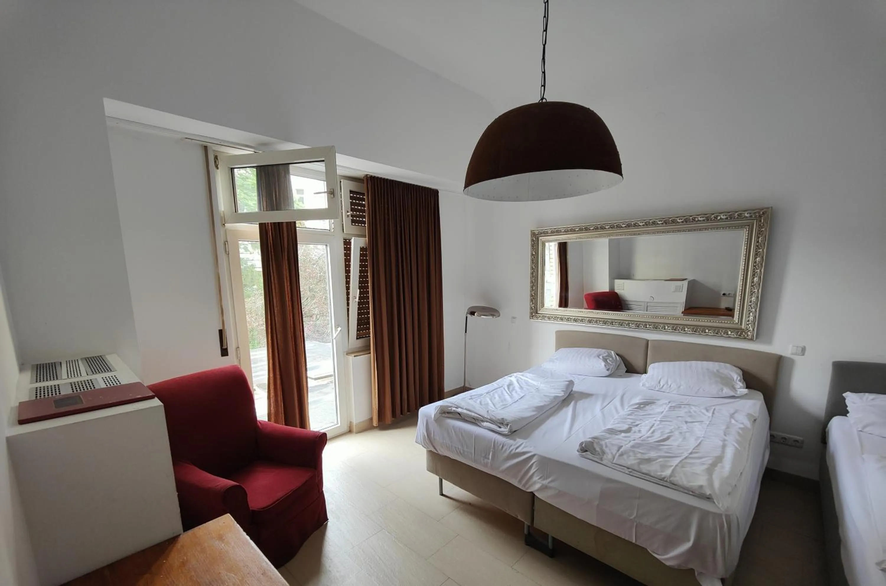 Photo of the whole room, Bed in Wasserturm Hotel Mannheim