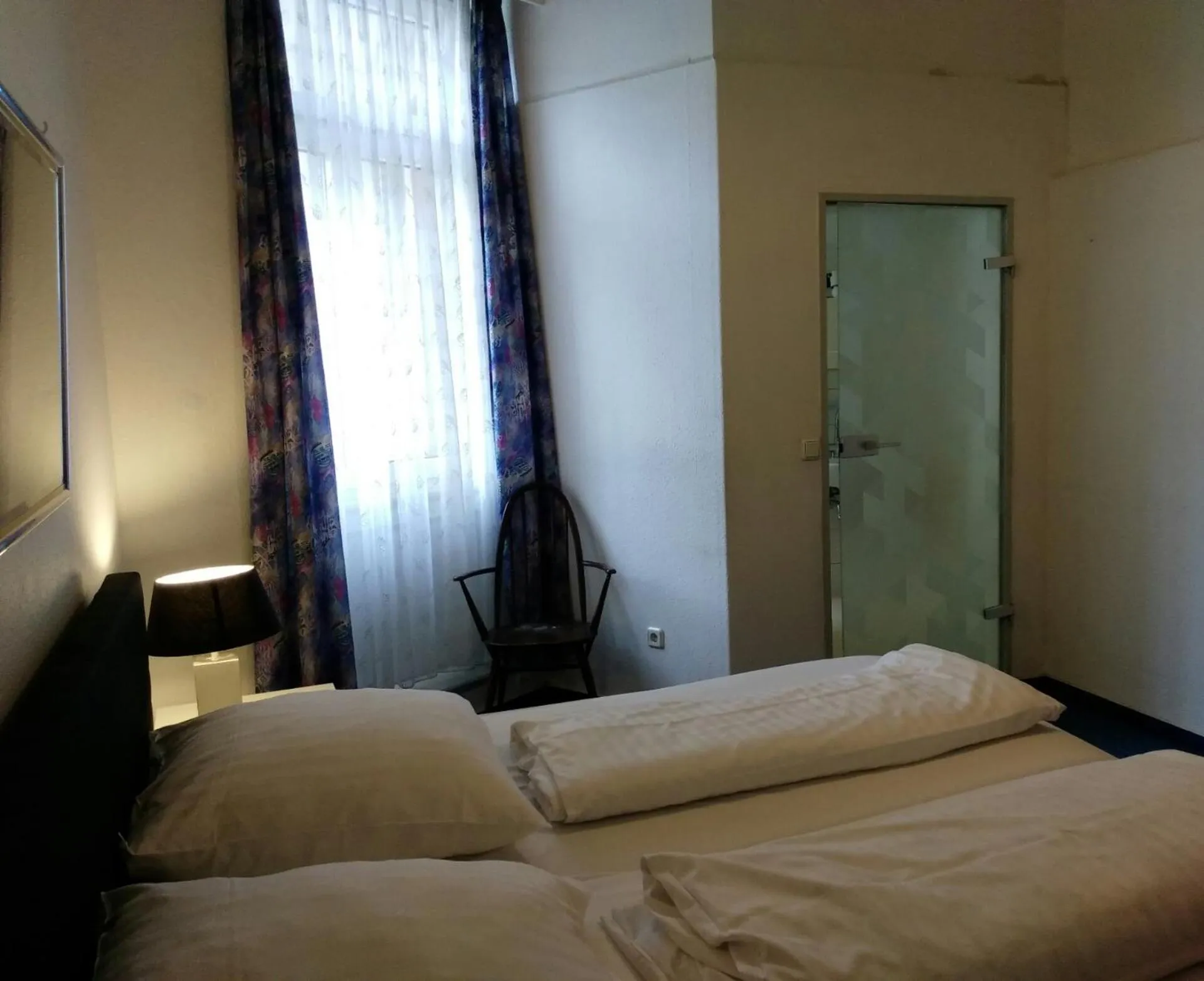 Photo of the whole room, Bed in Wasserturm Hotel Mannheim