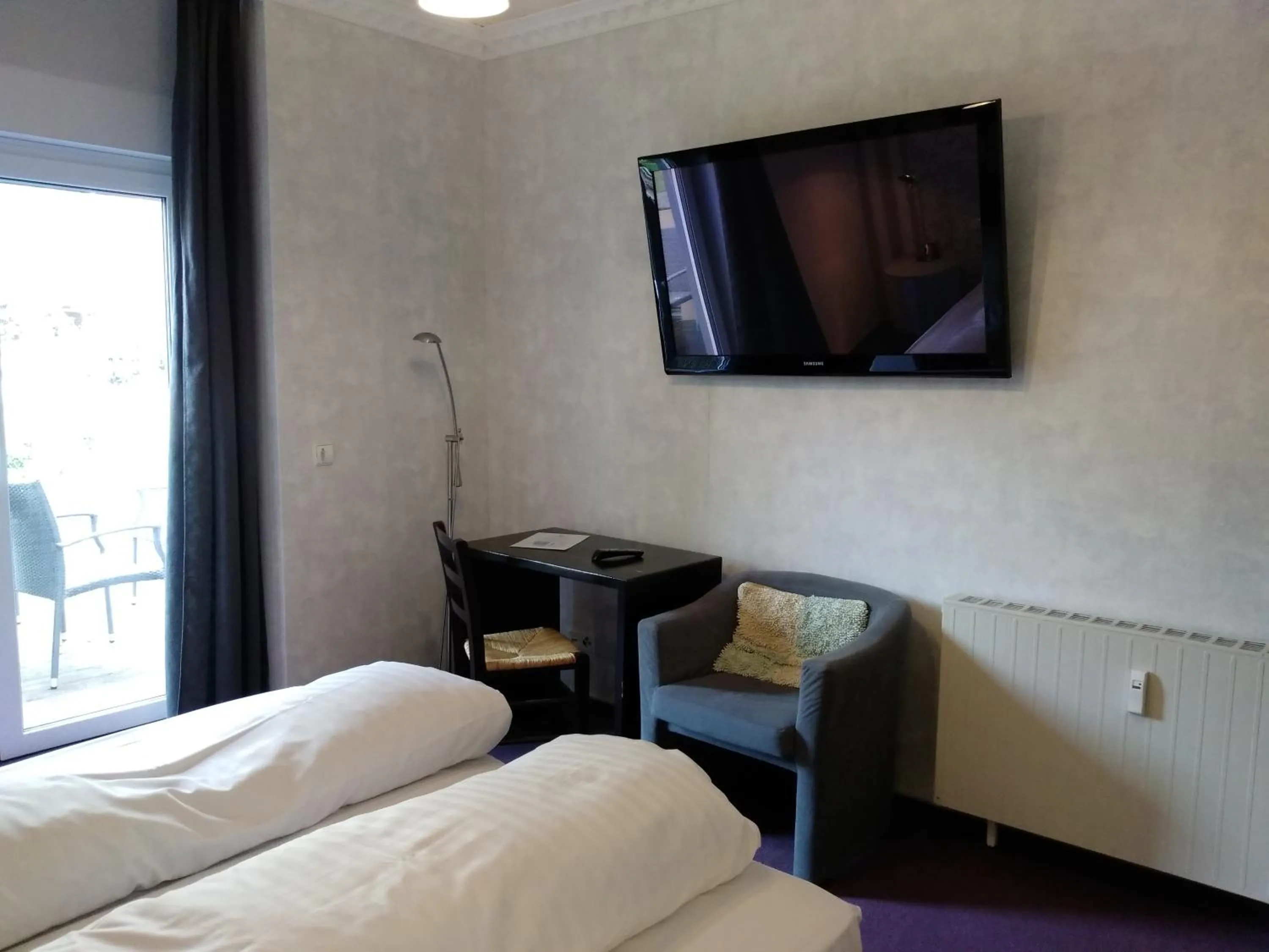 Photo of the whole room, Bed in Wasserturm Hotel Mannheim