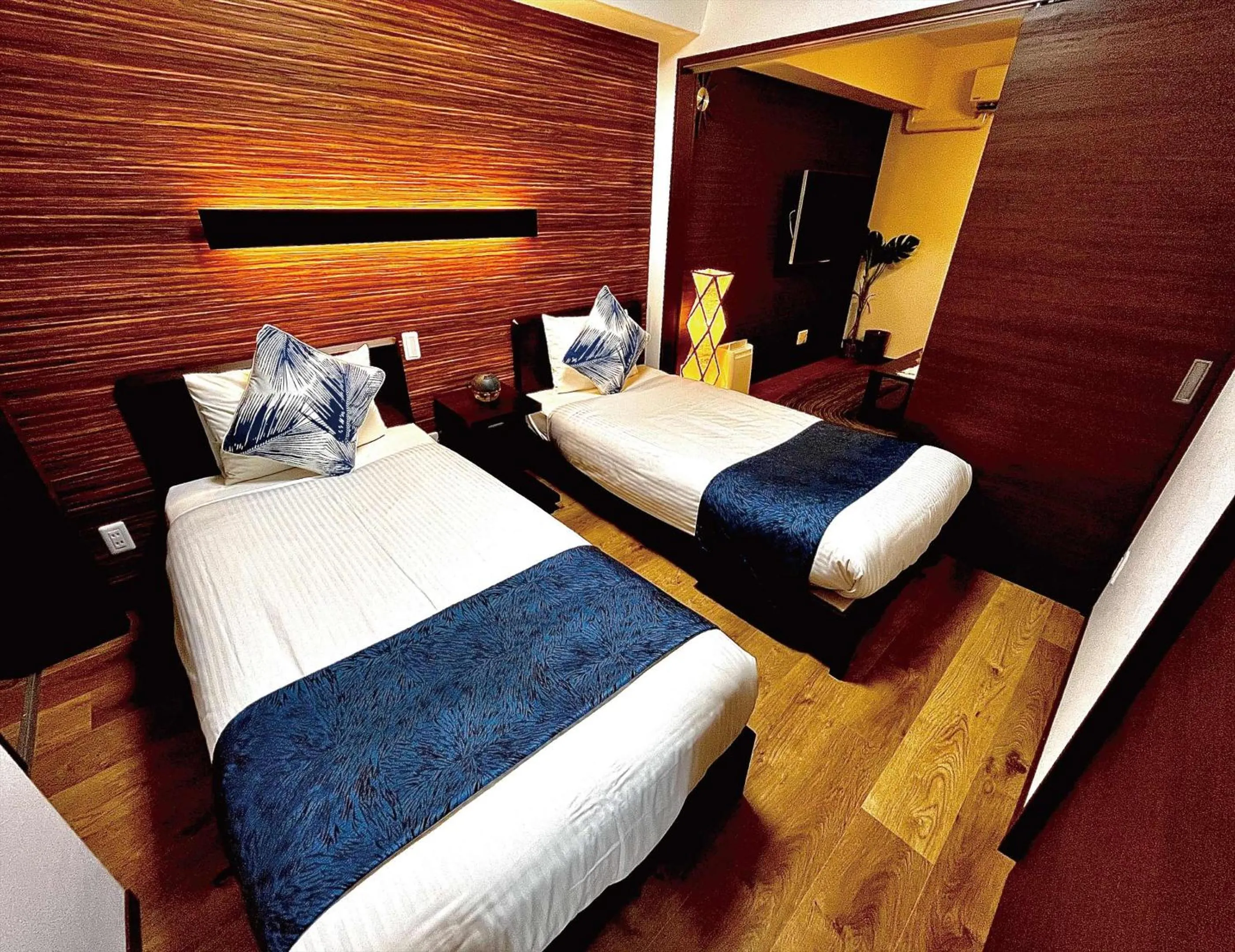 Bed in Zoe Resort The Sunset Village Okinawa Chatan