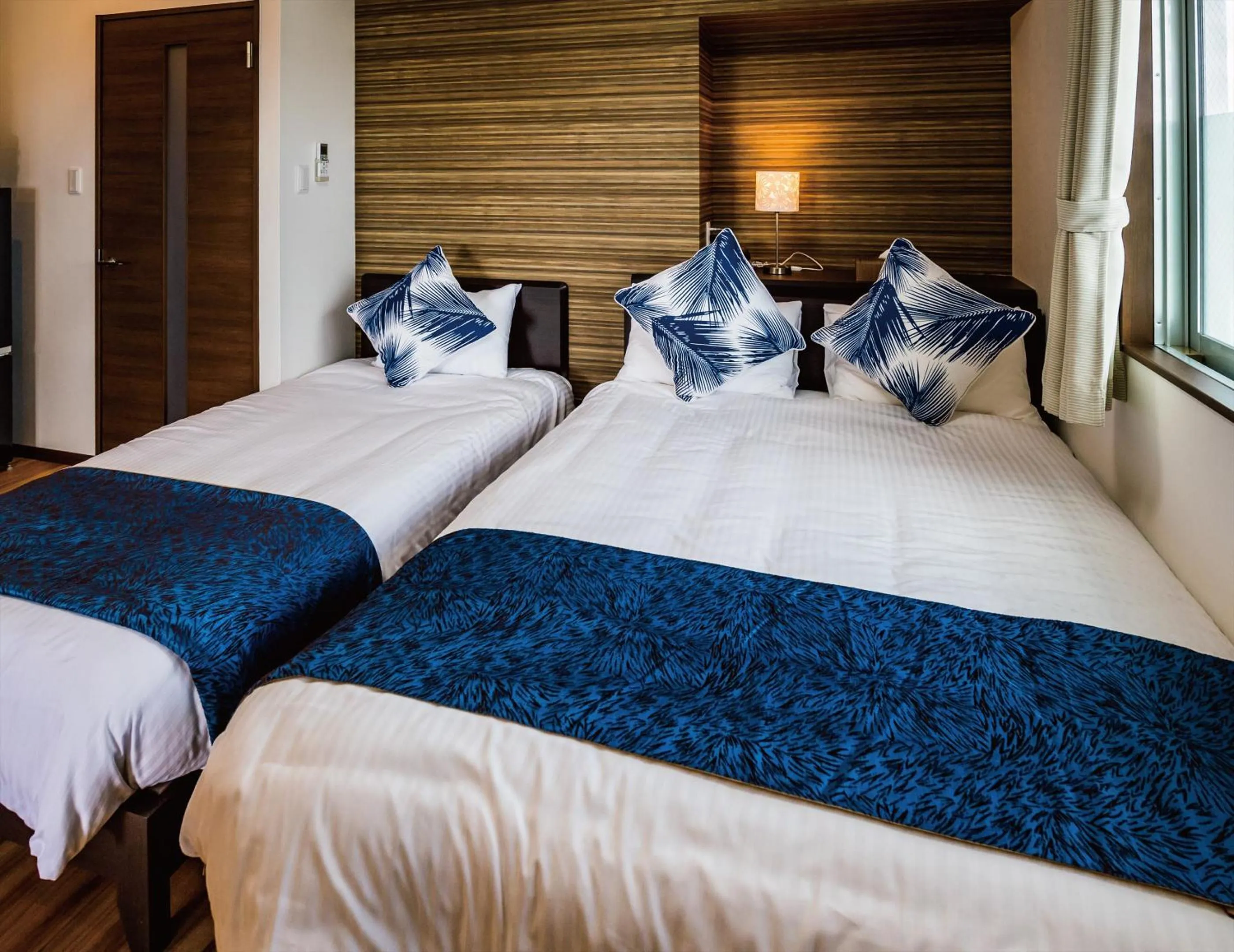 Bed in Zoe Resort The Sunset Village Okinawa Chatan