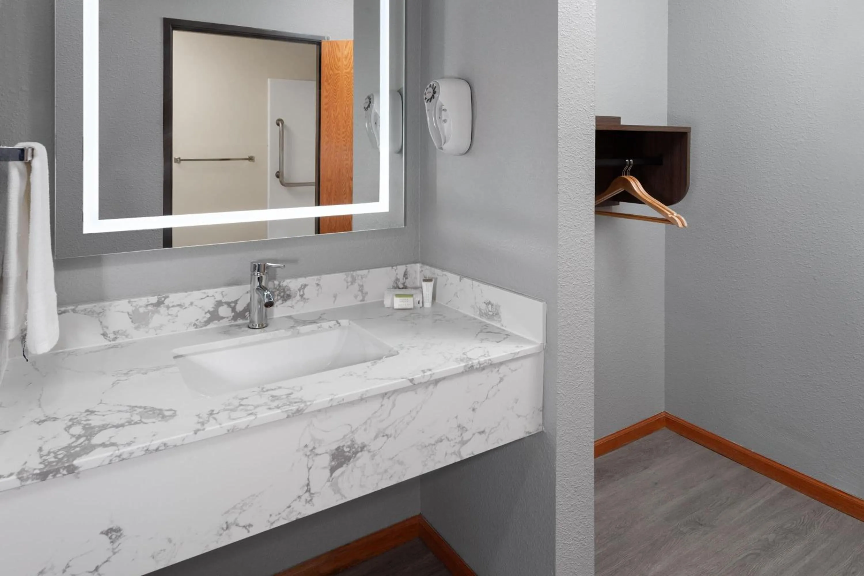 Bathroom in Super 8 by Wyndham McHenry Fox Lake Area