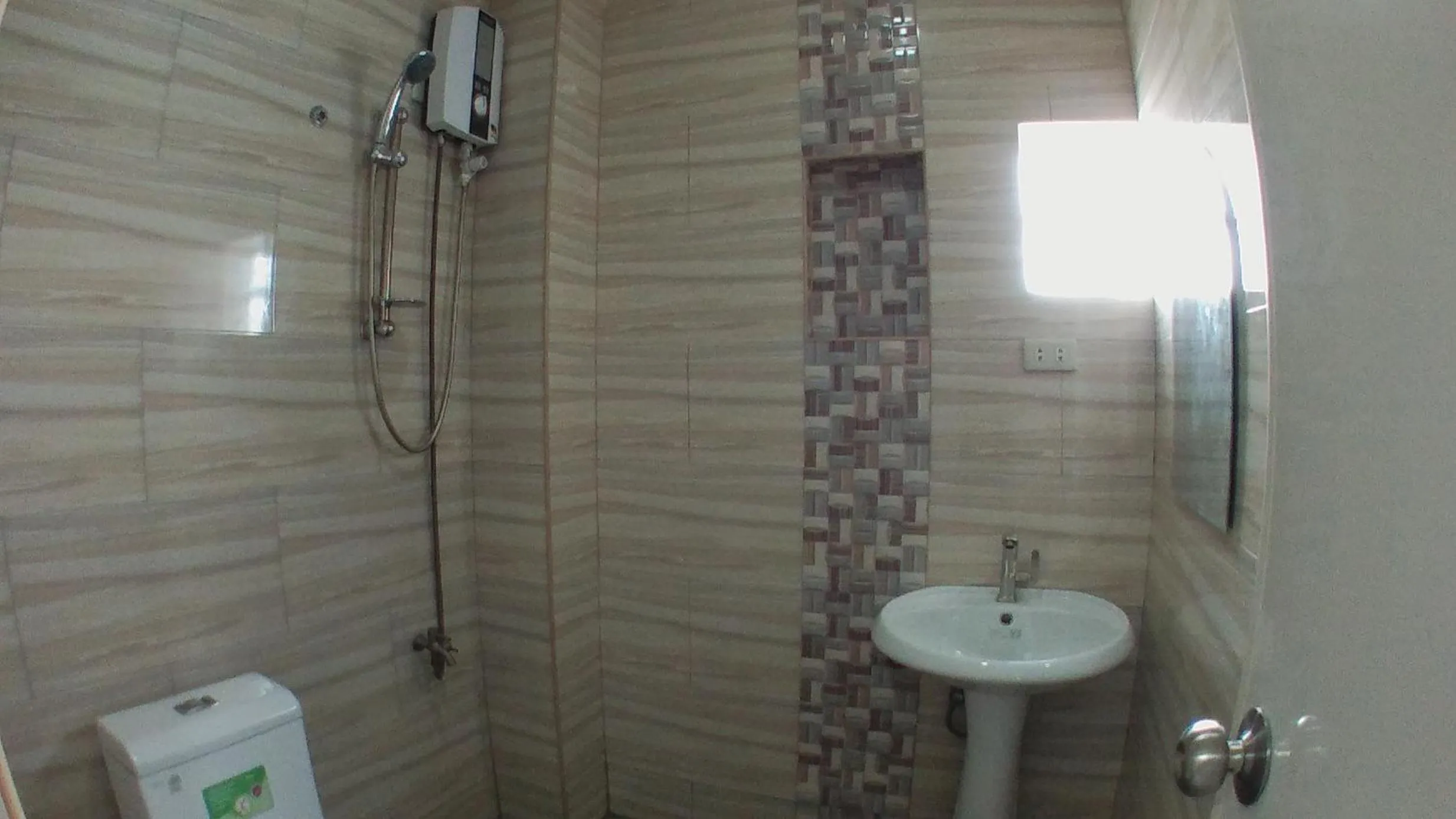 Bathroom in Beinte Singko de Marso Apartments