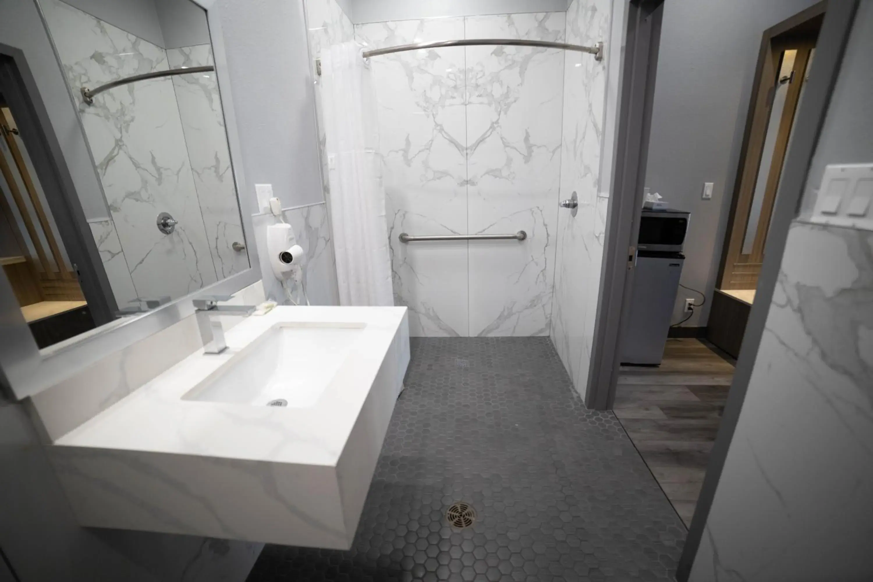 Bathroom in Travelodge by Wyndham Whittier Bathroom in Travelodge by Wyndham Whittier