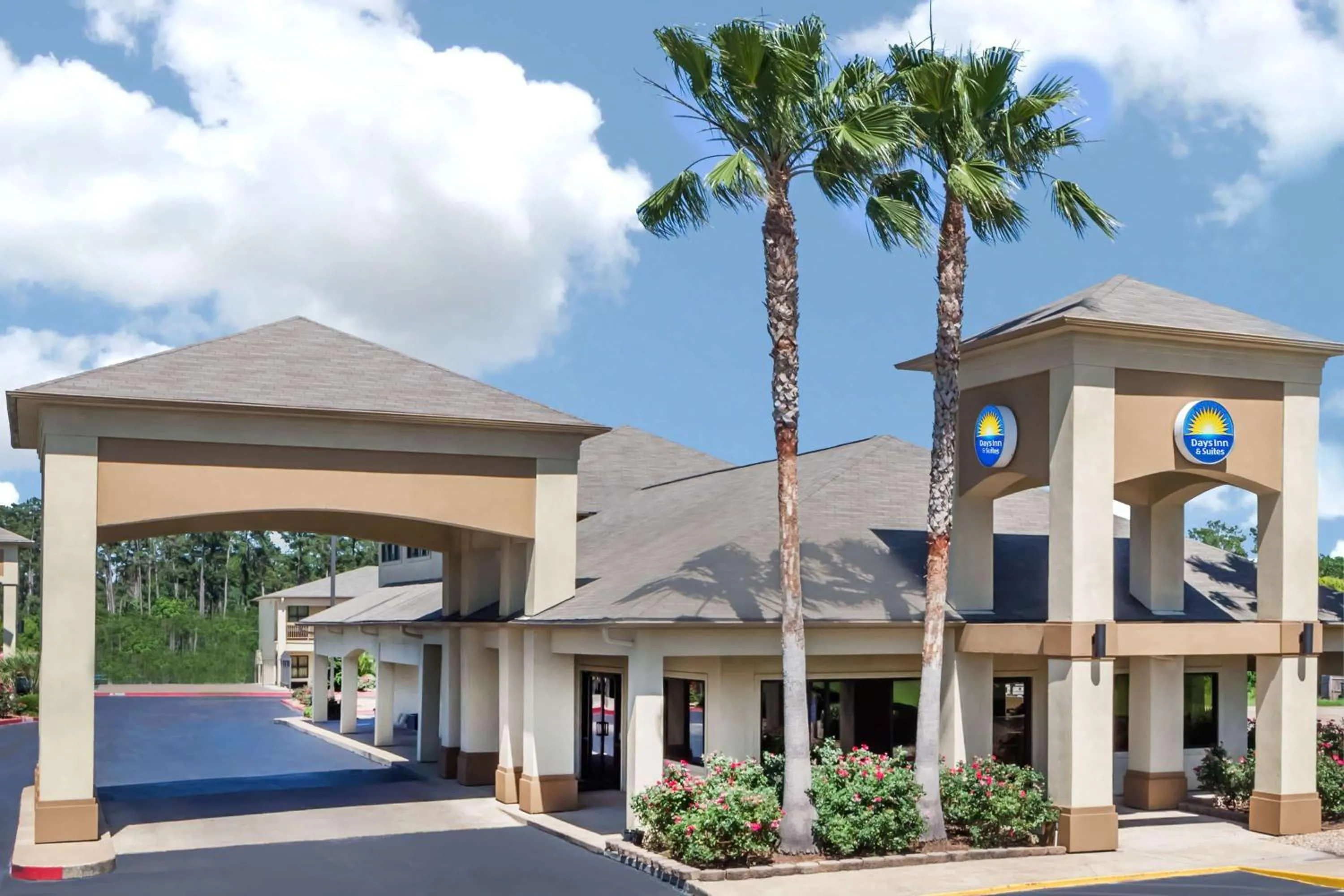 Property building in Days Inn & Suites by Wyndham Huntsville