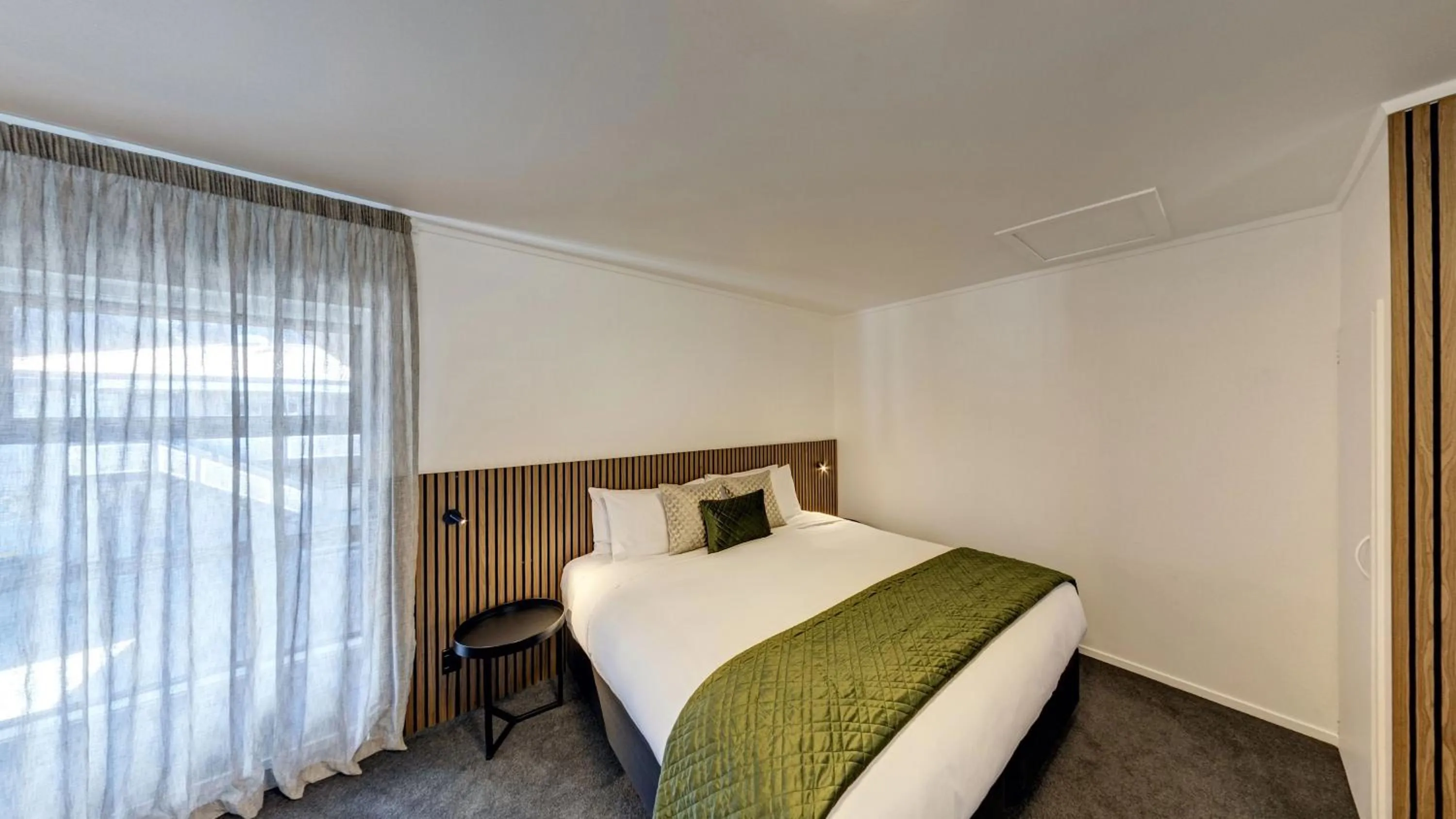 Bed in Blue Peaks Lodge