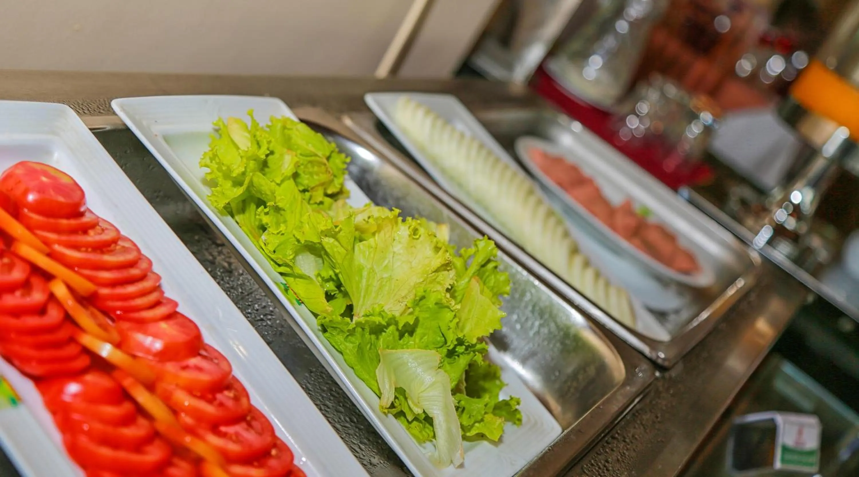 Continental breakfast in Oak Ray Serene Garden Hotel