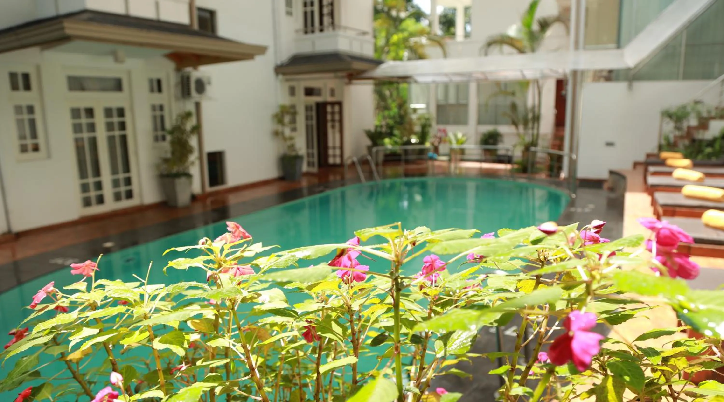 Swimming pool in Oak Ray Serene Garden Hotel