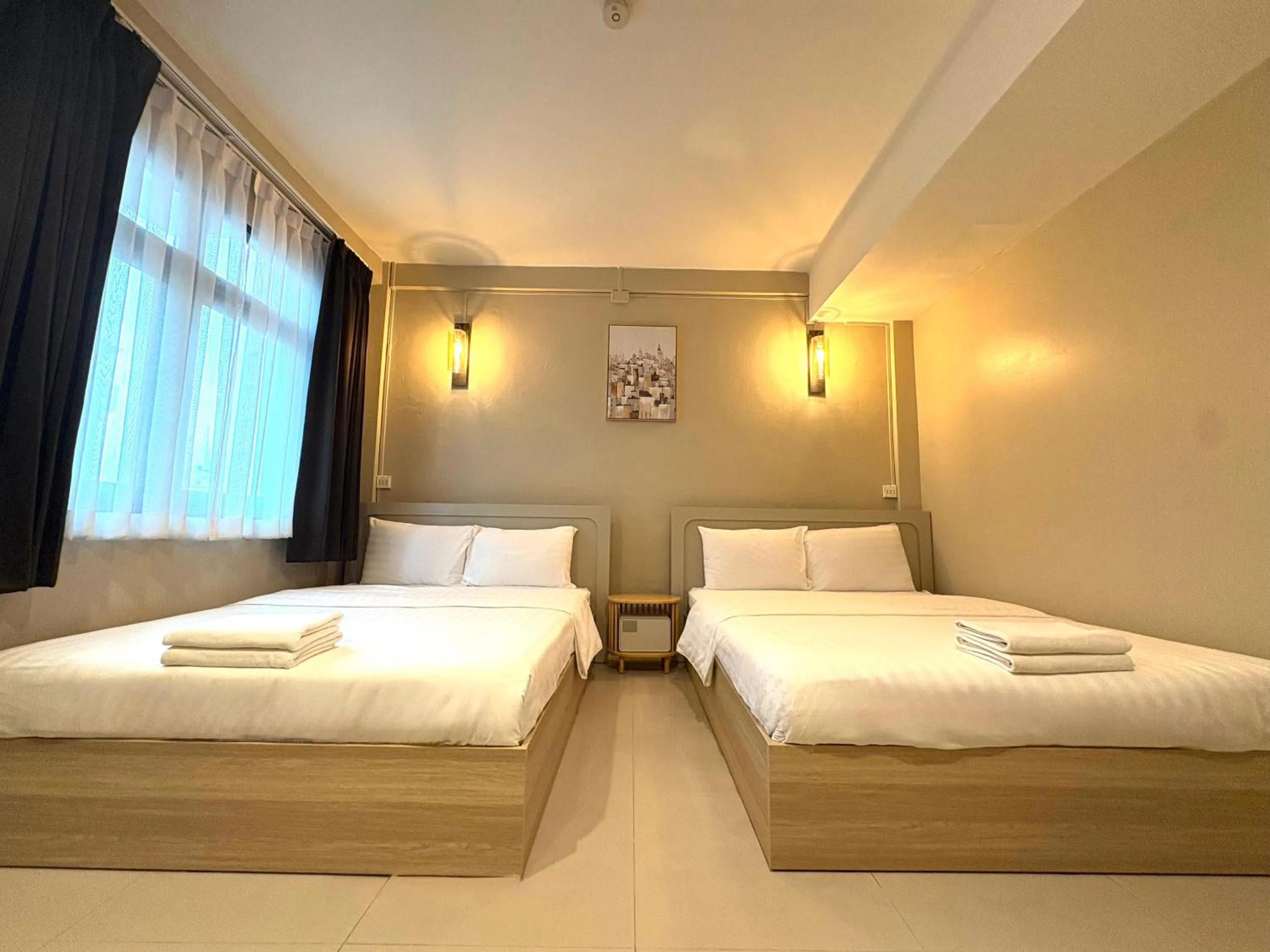 Bed in At Hua Lamphong Hotel