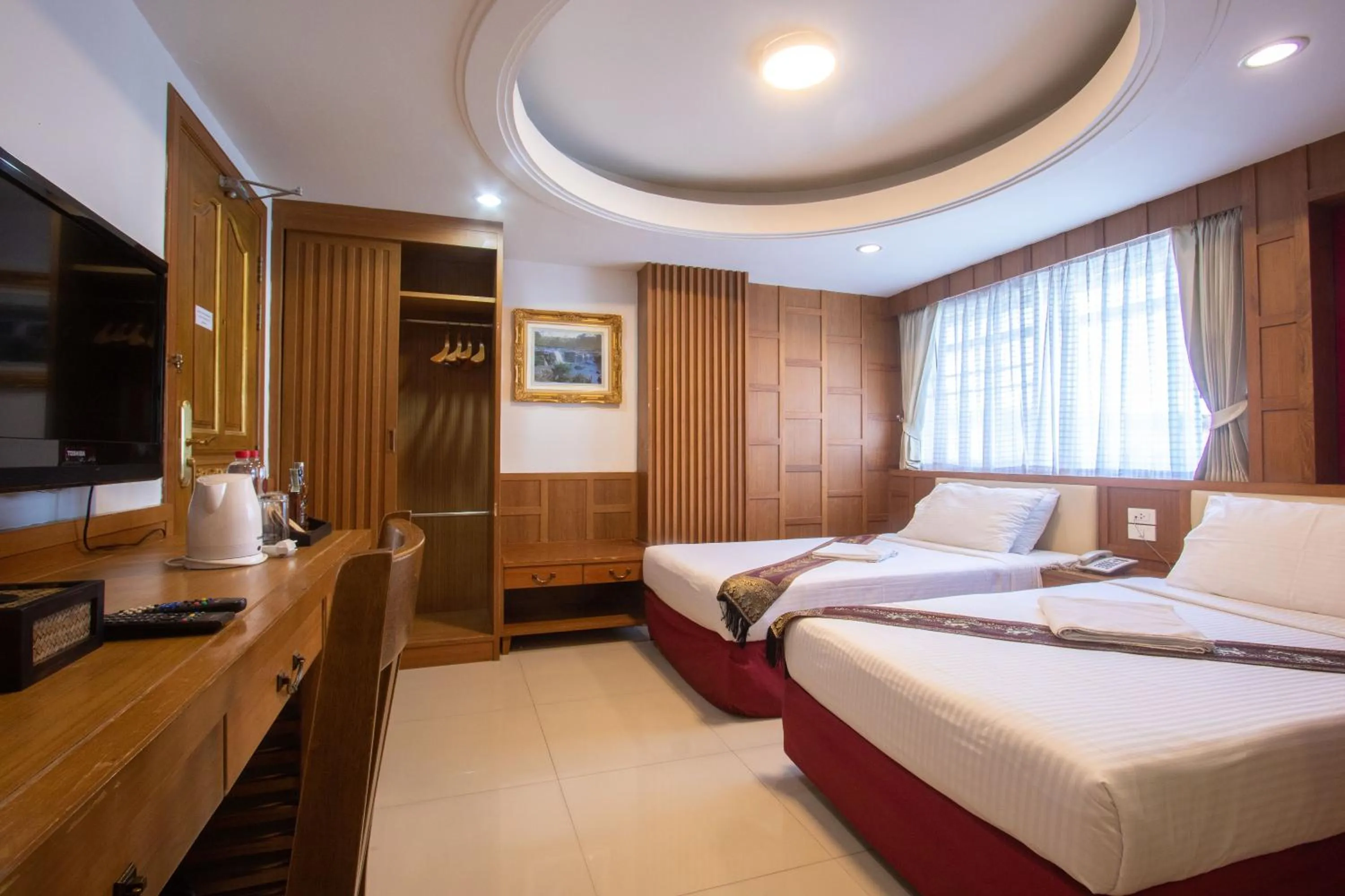 Bed in Gusto Pratunam Hotel