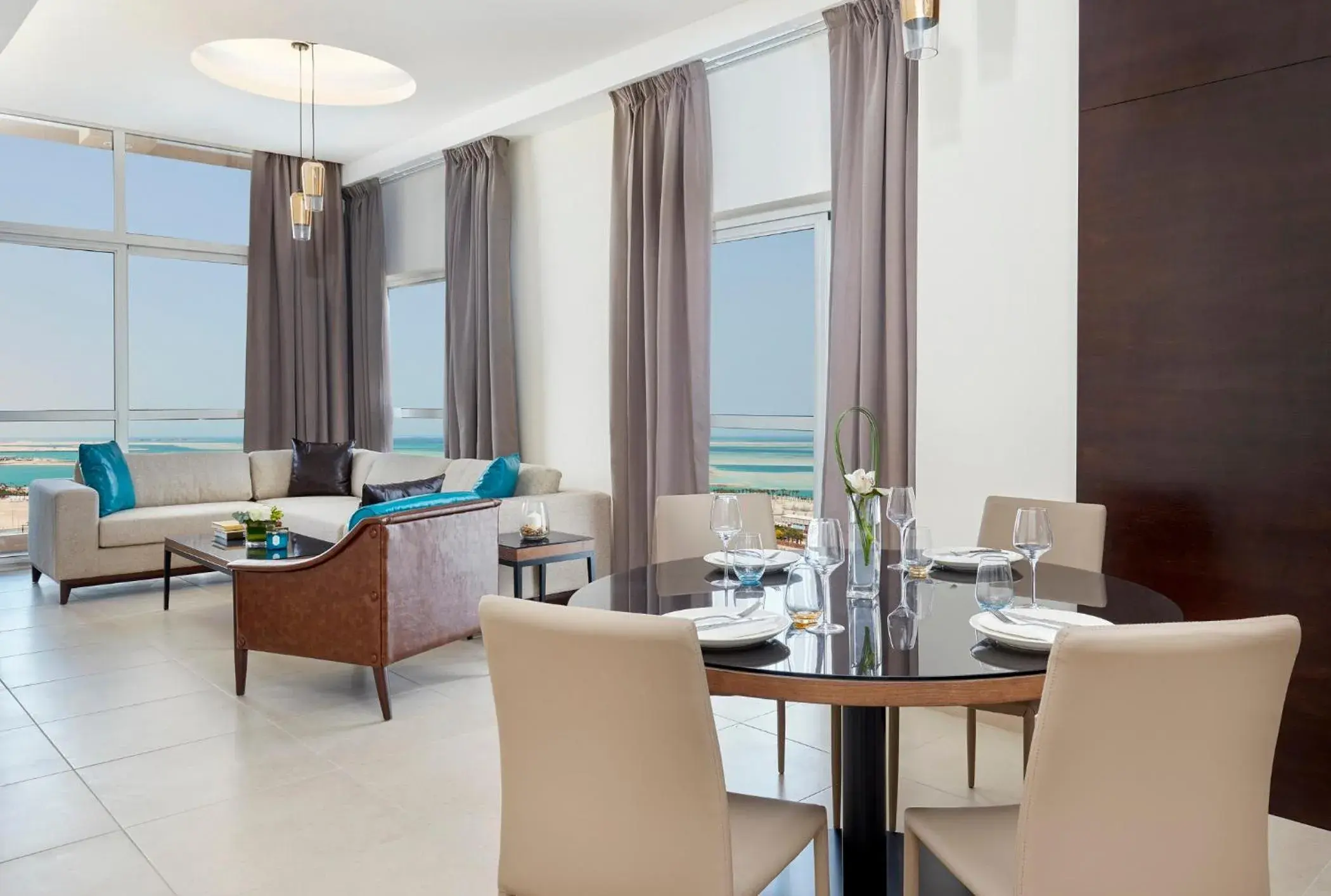 Living room in Staybridge Suites - Doha Lusail by IHG Living room in Staybridge Suites - Doha Lusail by IHG