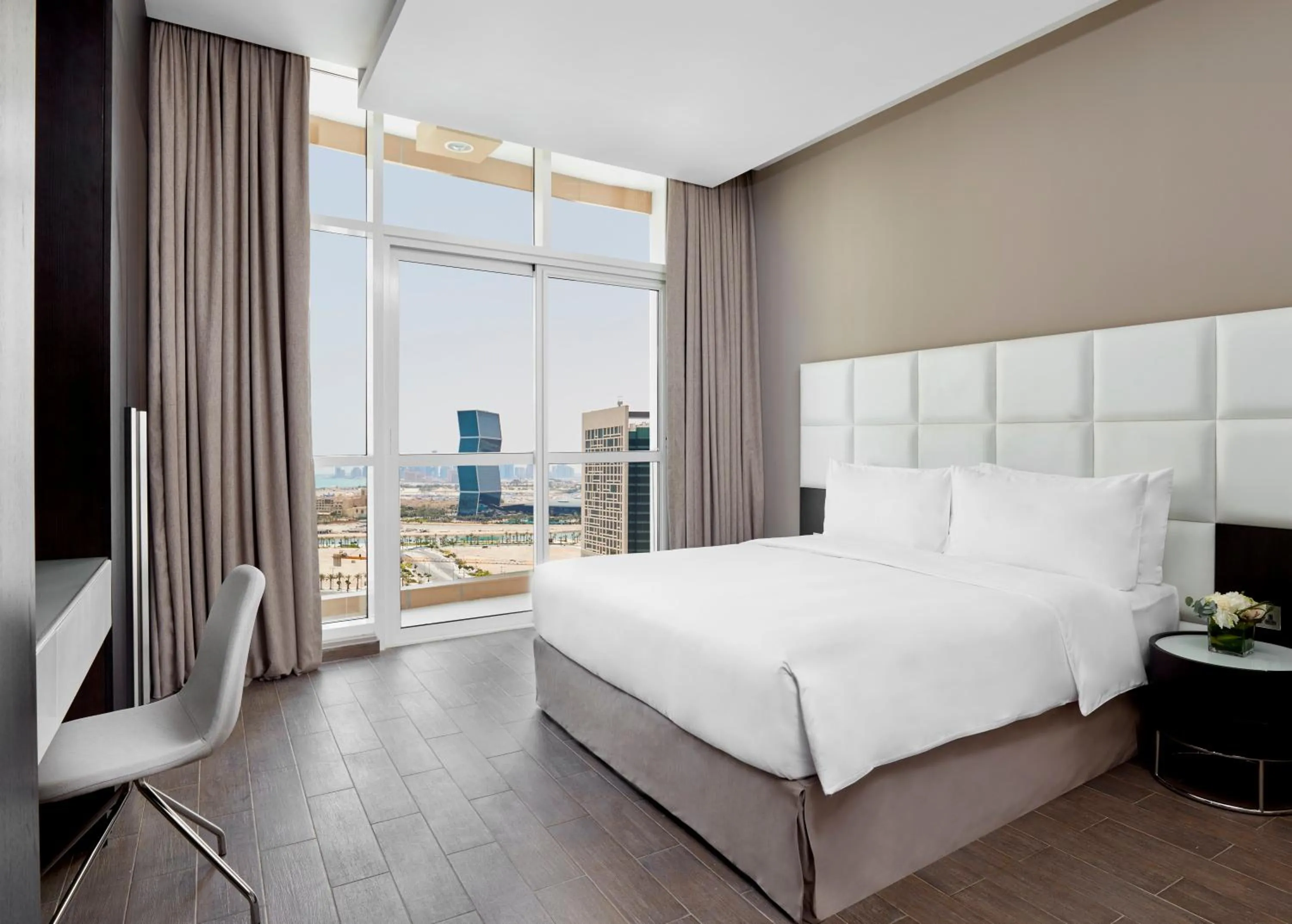 Photo of the whole room, Bed in Staybridge Suites - Doha Lusail by IHG
