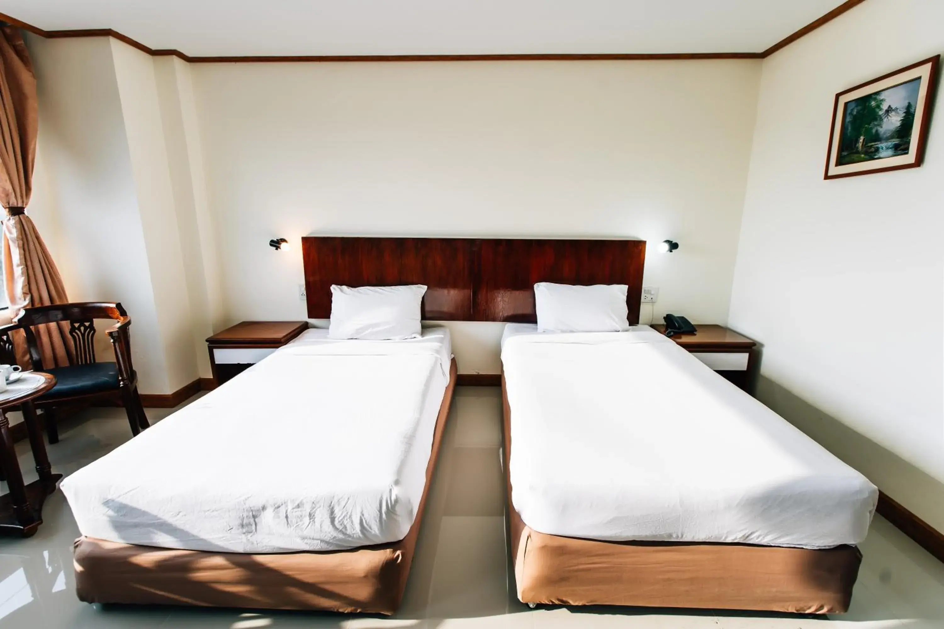 Bed in Sinkiat Thani Hotel Bed in Sinkiat Thani Hotel