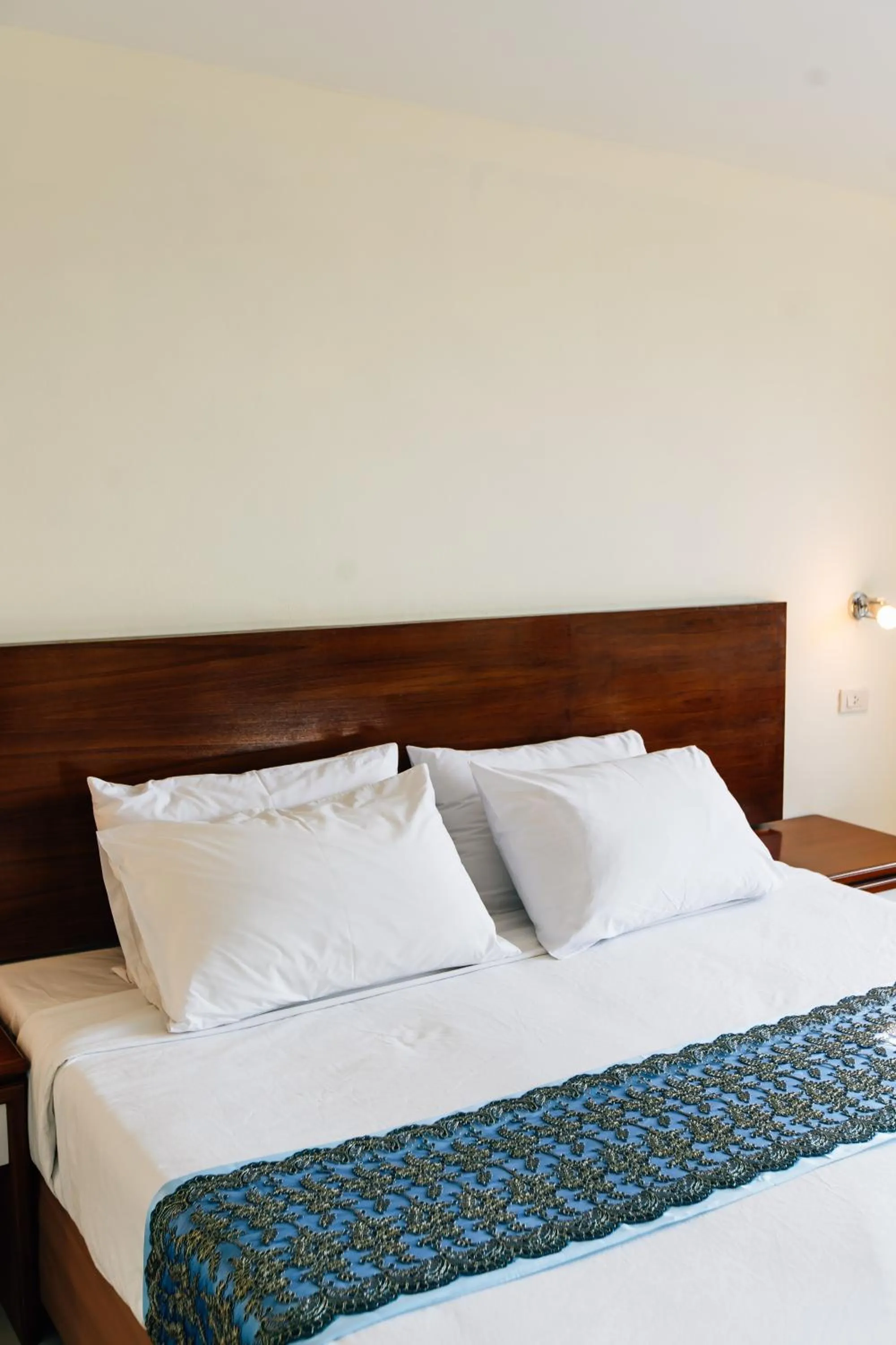 Bed in Sinkiat Thani Hotel