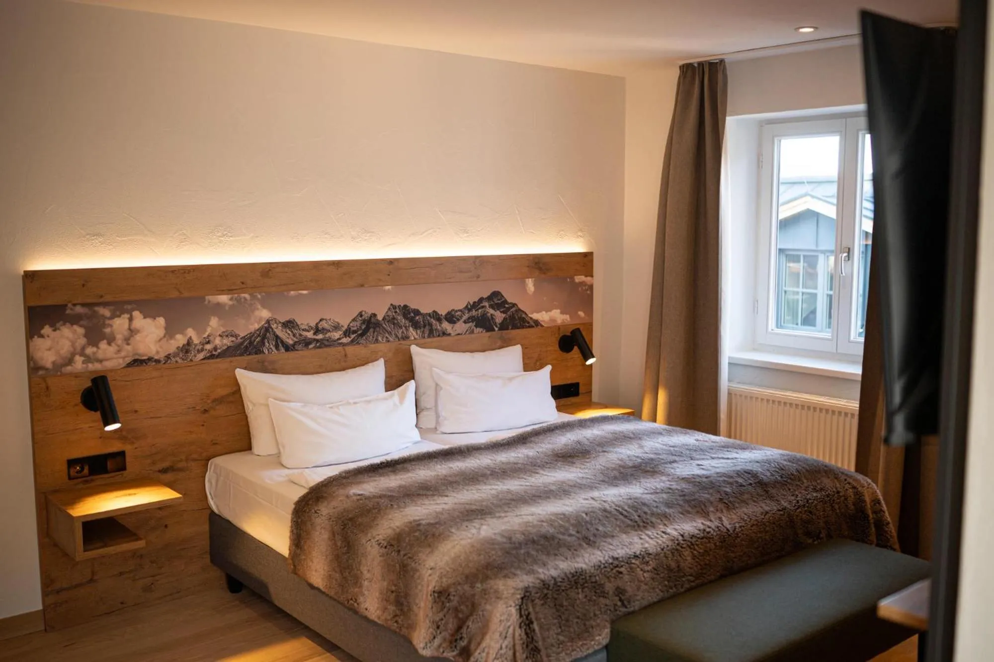 Photo of the whole room, Bed in Alpin Lifestyle Hotel Löwen & Strauss