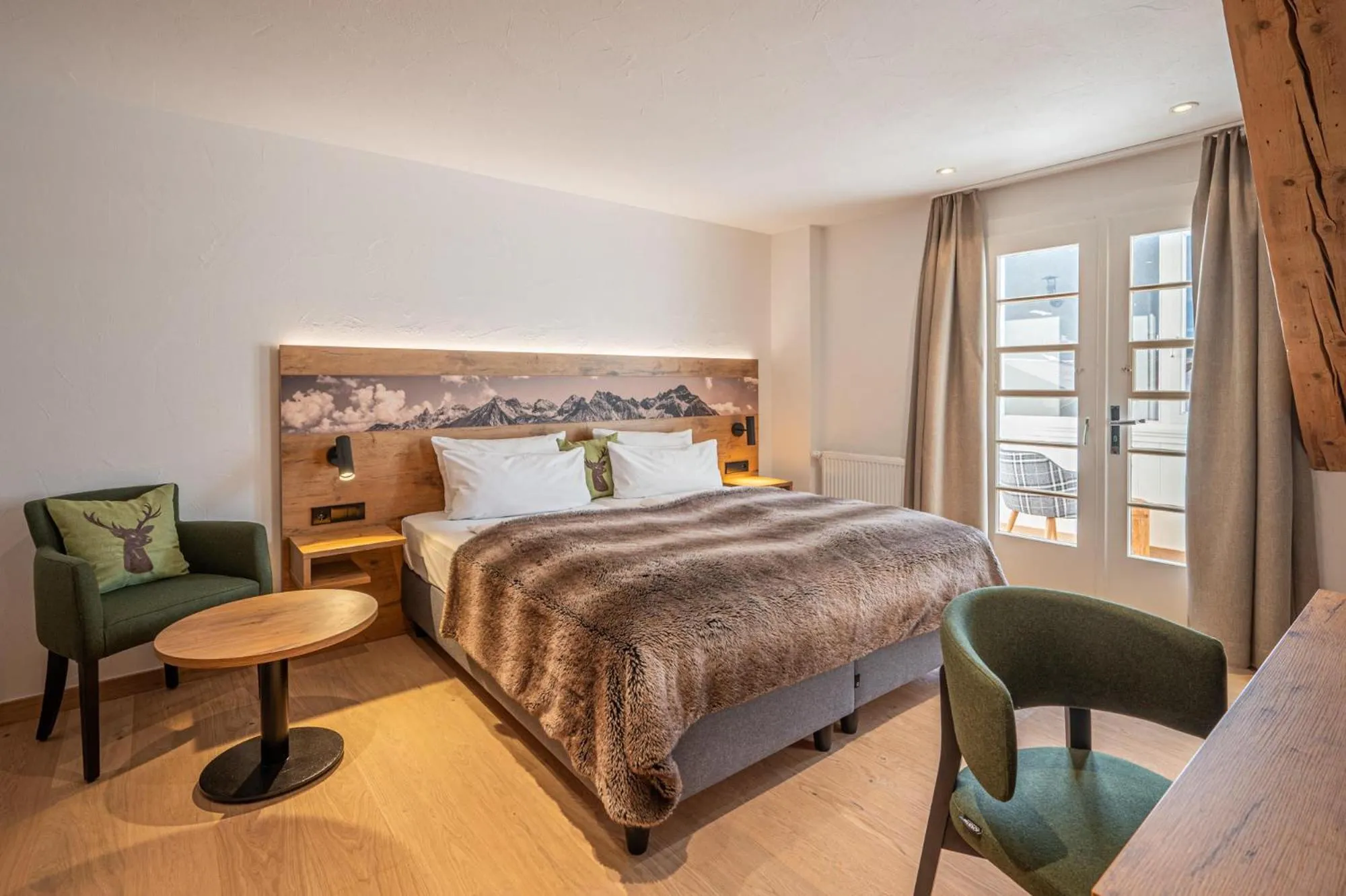 Photo of the whole room, Bed in Alpin Lifestyle Hotel Löwen & Strauss