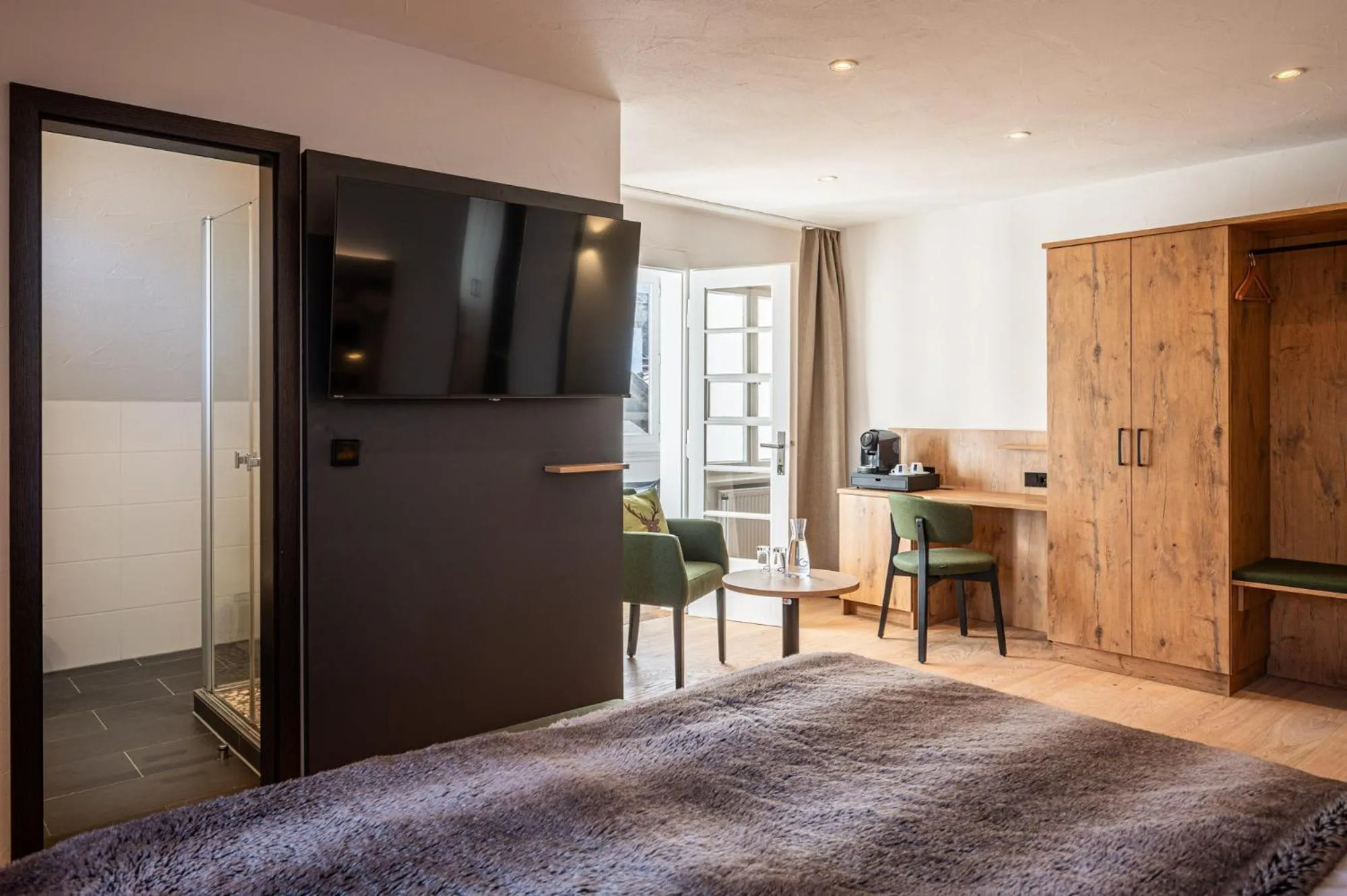 Photo of the whole room, Bed in Alpin Lifestyle Hotel Löwen & Strauss