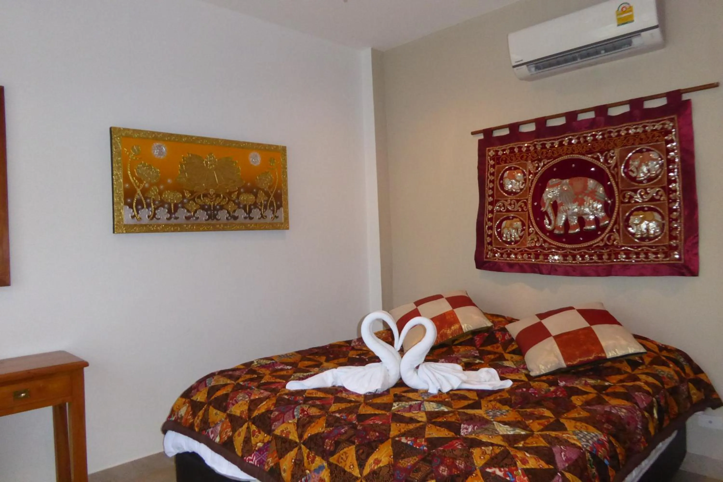 Bed in Tropicana Beach Villa at VIP Resort