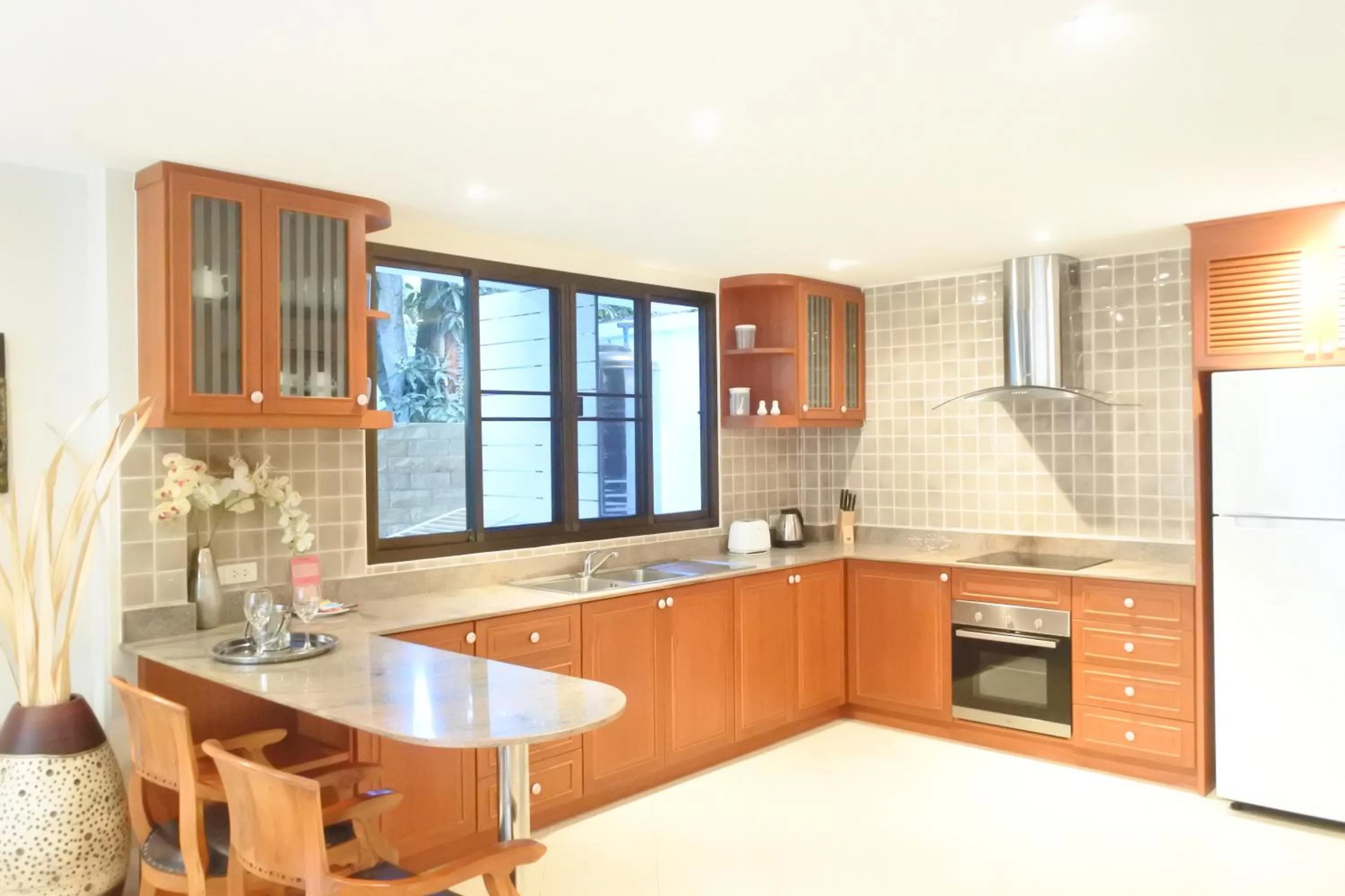 Kitchen or kitchenette in Tropicana Beach Villa at VIP Resort