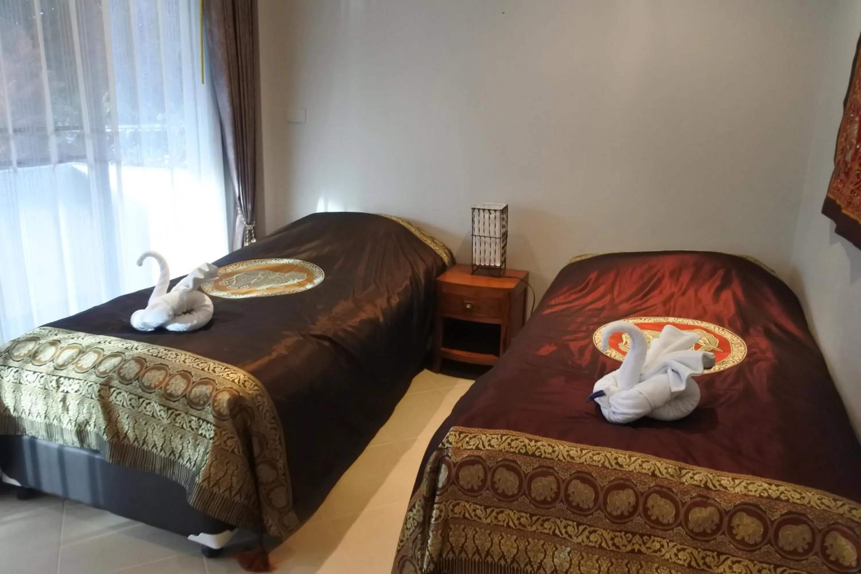 Bed in Tropicana Beach Villa at VIP Resort