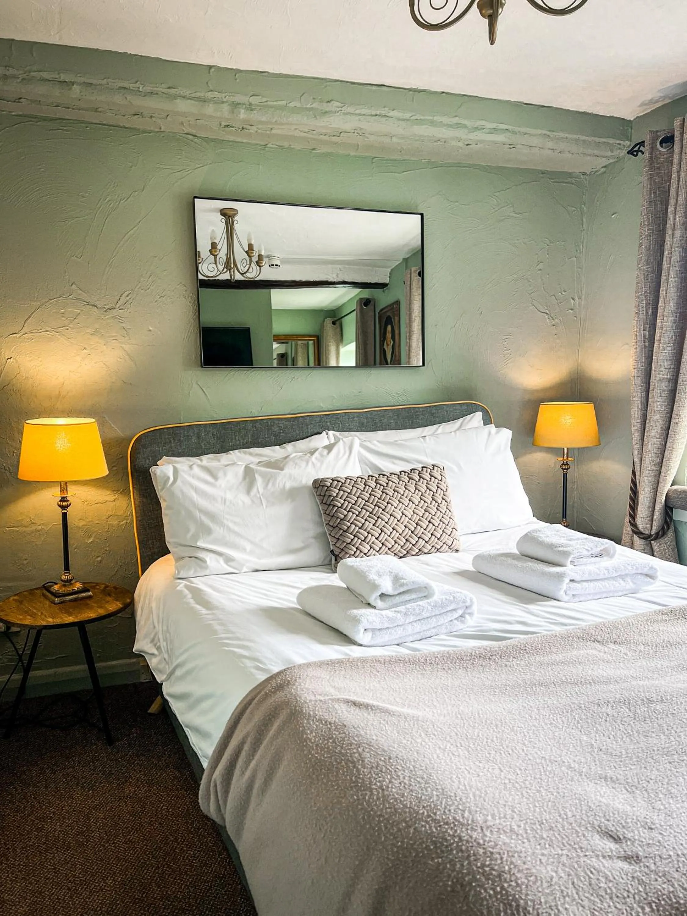 Bathroom, Bed in Rising Sun Hotel