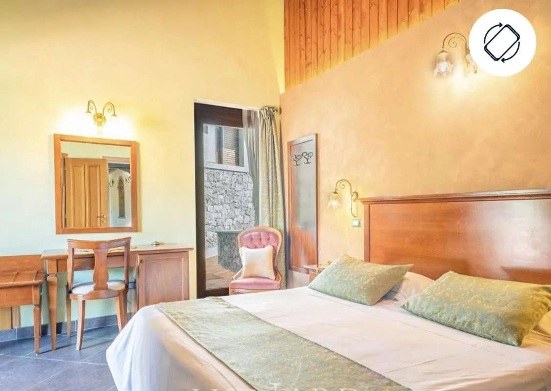 Bed in Antico Borgo Petralia