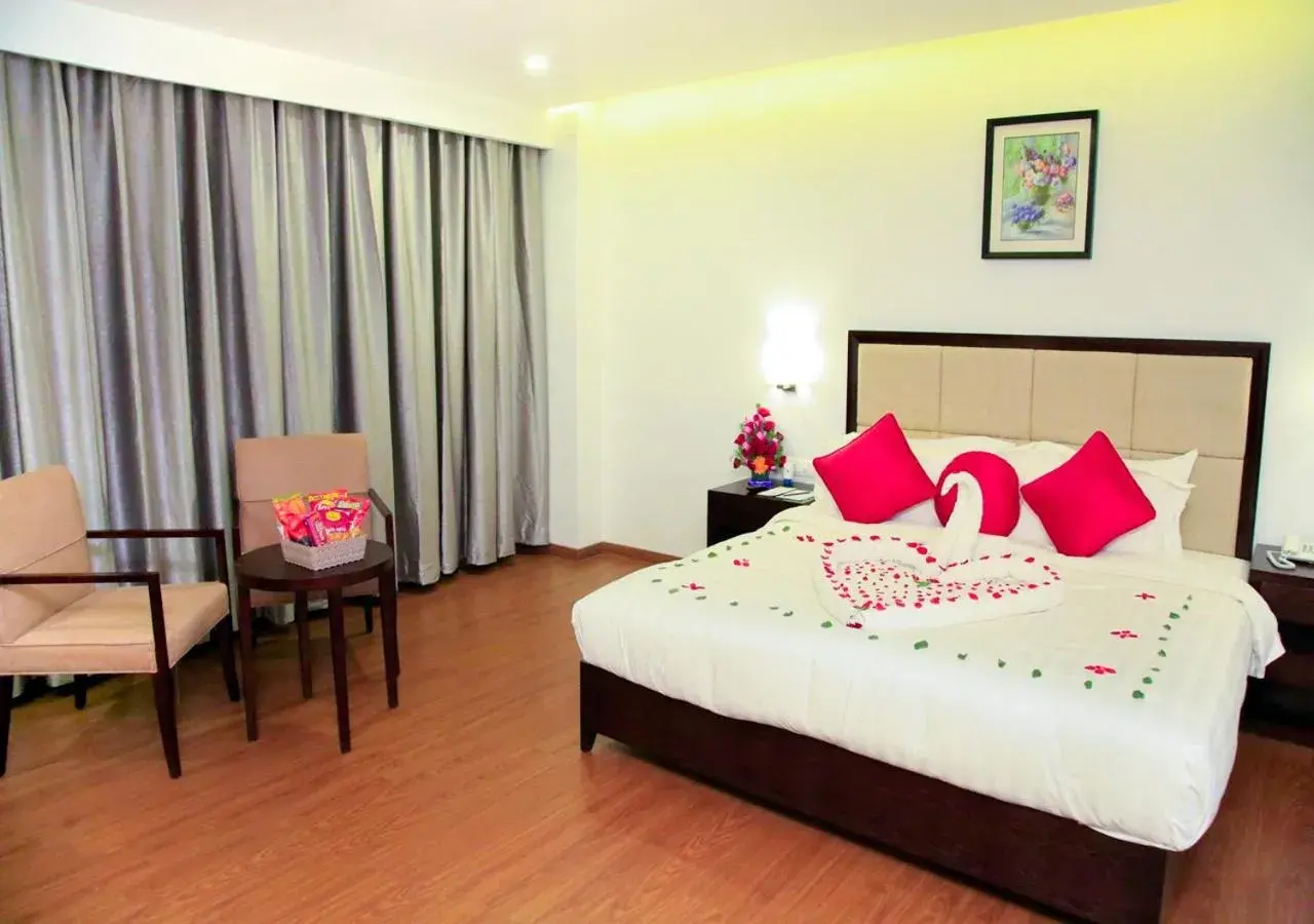 Bedroom, Bed in Triguna Clarks Inn Kurnool Bedroom, Bed in Triguna Clarks Inn Kurnool