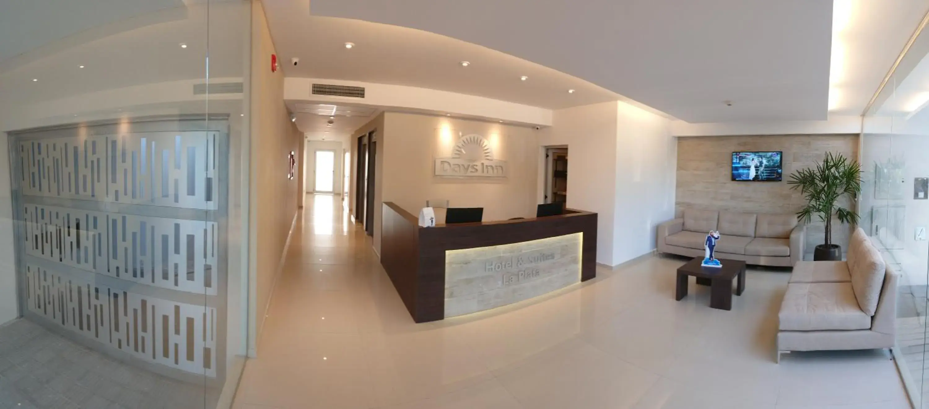 Lobby or reception in Days Inn & Suites by Wyndham La Plata Lobby or reception in Days Inn & Suites by Wyndham La Plata