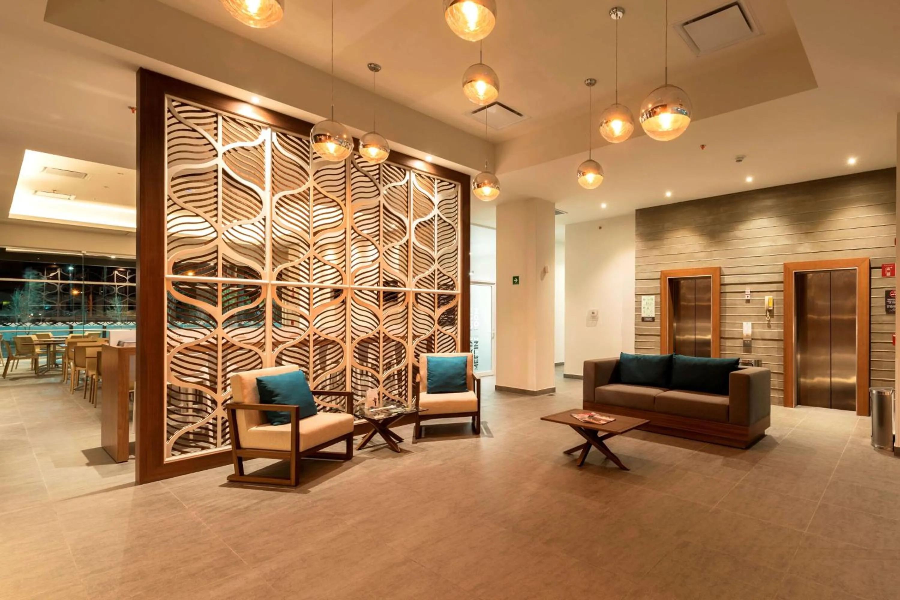 Seating area in Microtel Inn & Suites by Wyndham San Luis Potosi