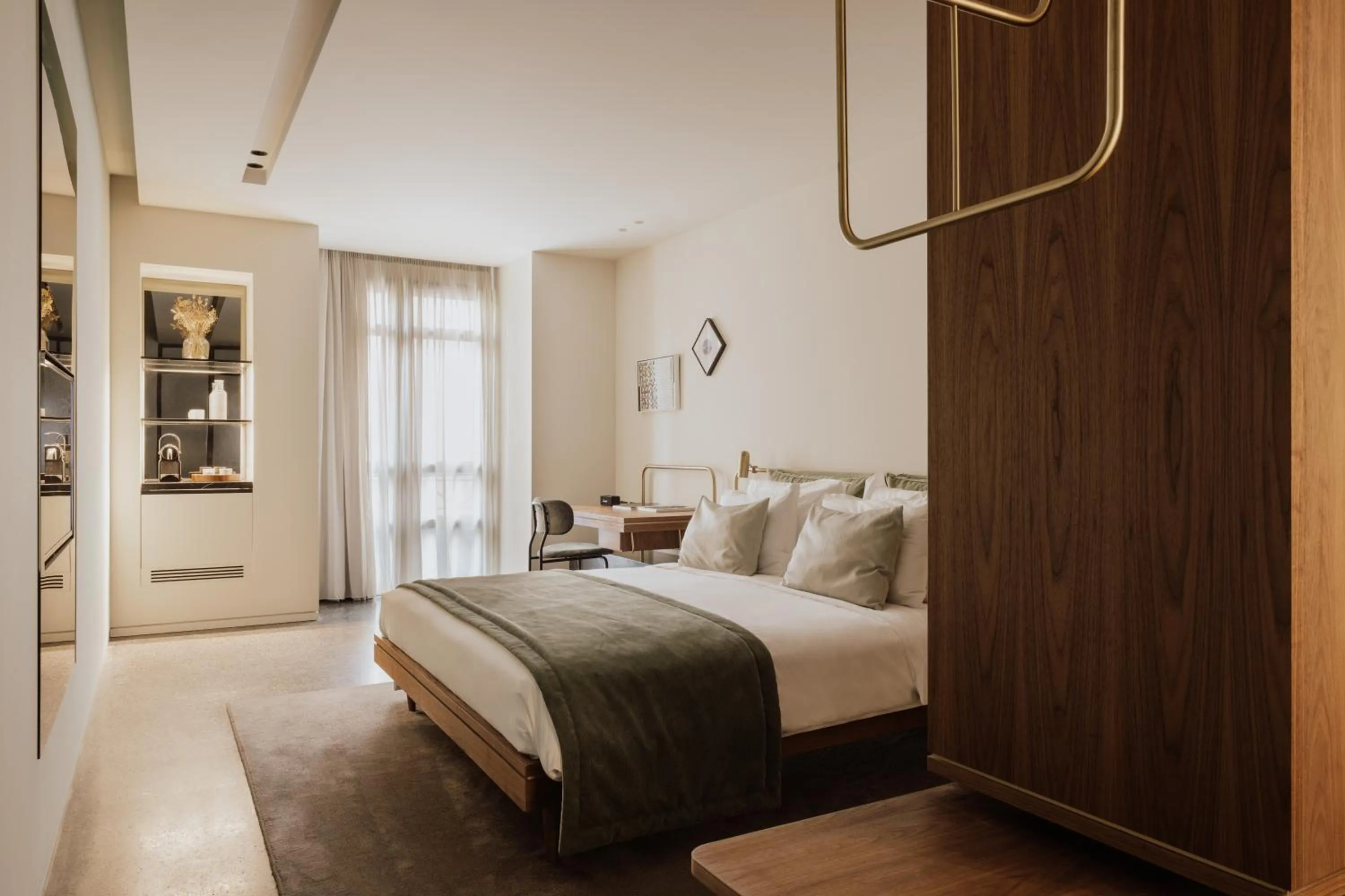 Bed in Perianth Hotel, a Member of Design Hotels