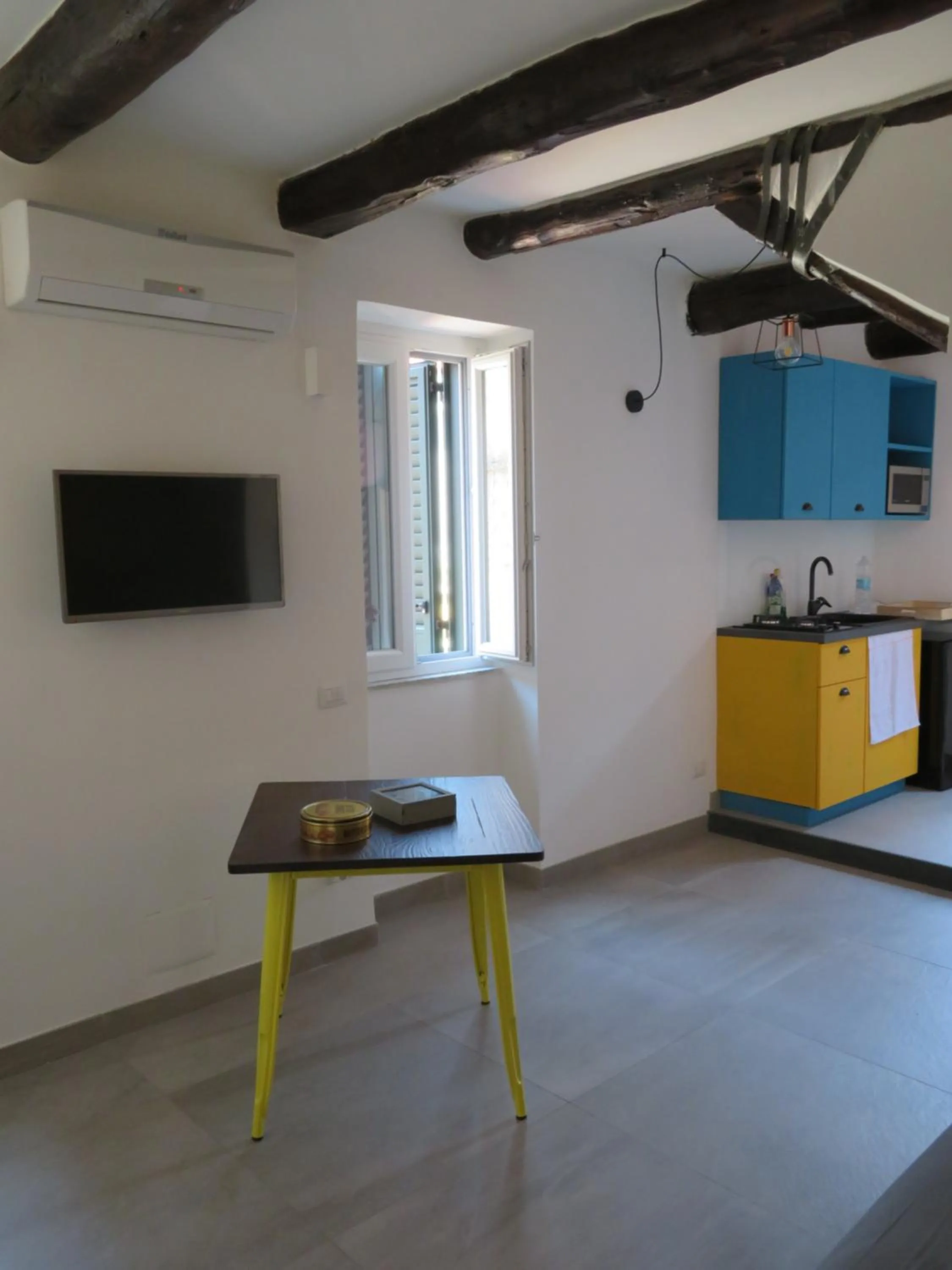 Seating area in Napoli Suite Toledo 10 By Dimorra