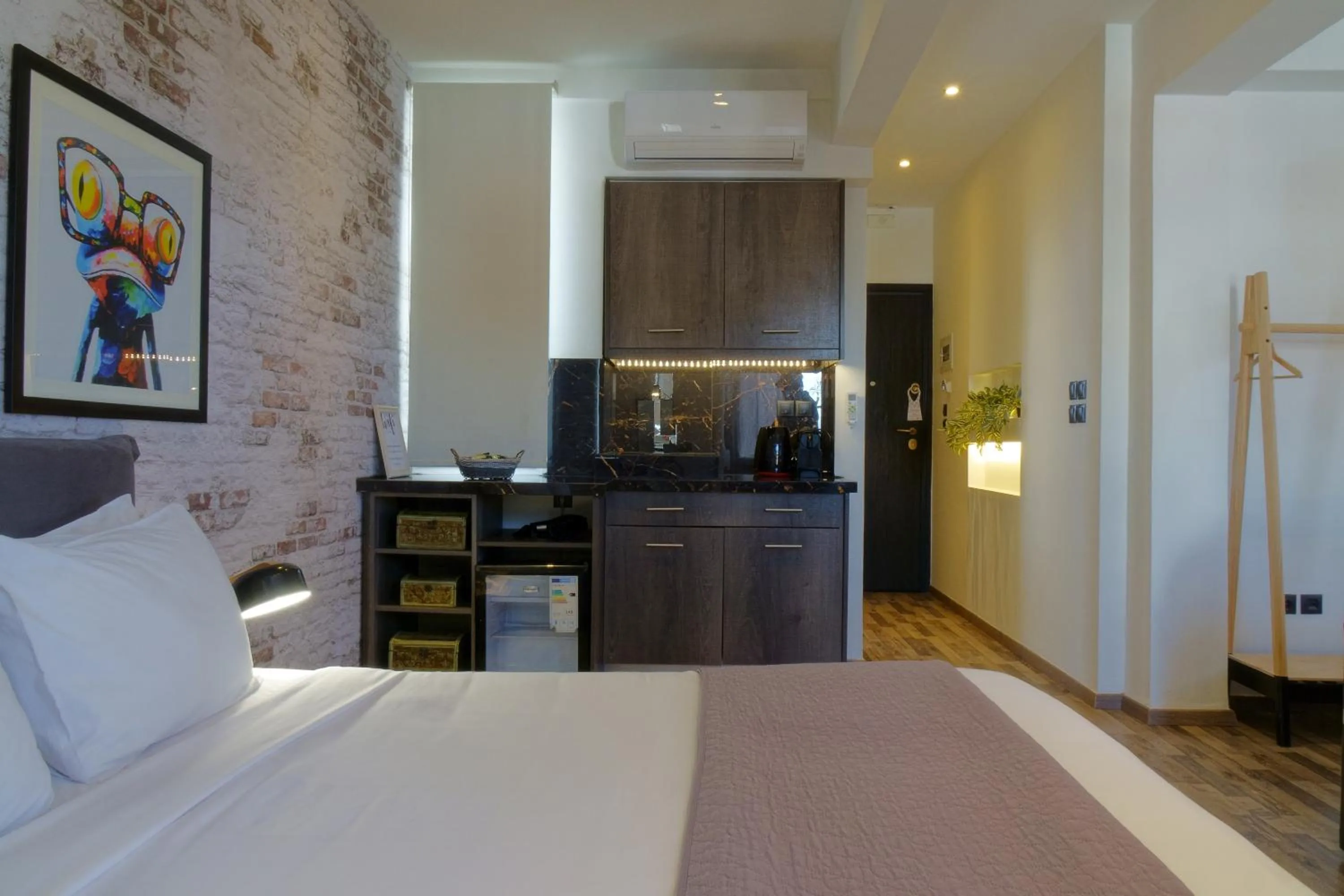 Kitchen or kitchenette, Bed in The Athens Version Luxury Suites
