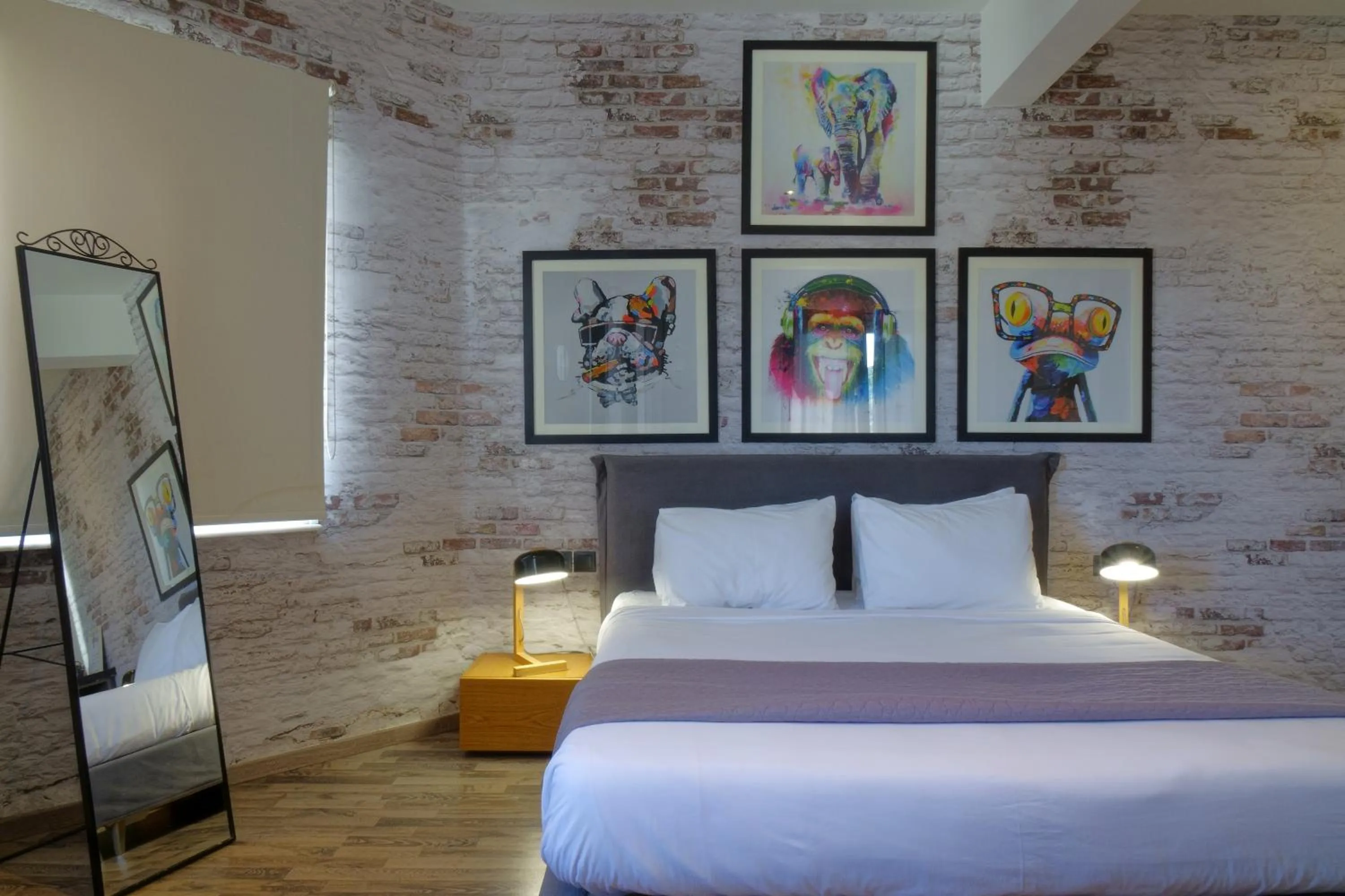 Bed in The Athens Version Luxury Suites