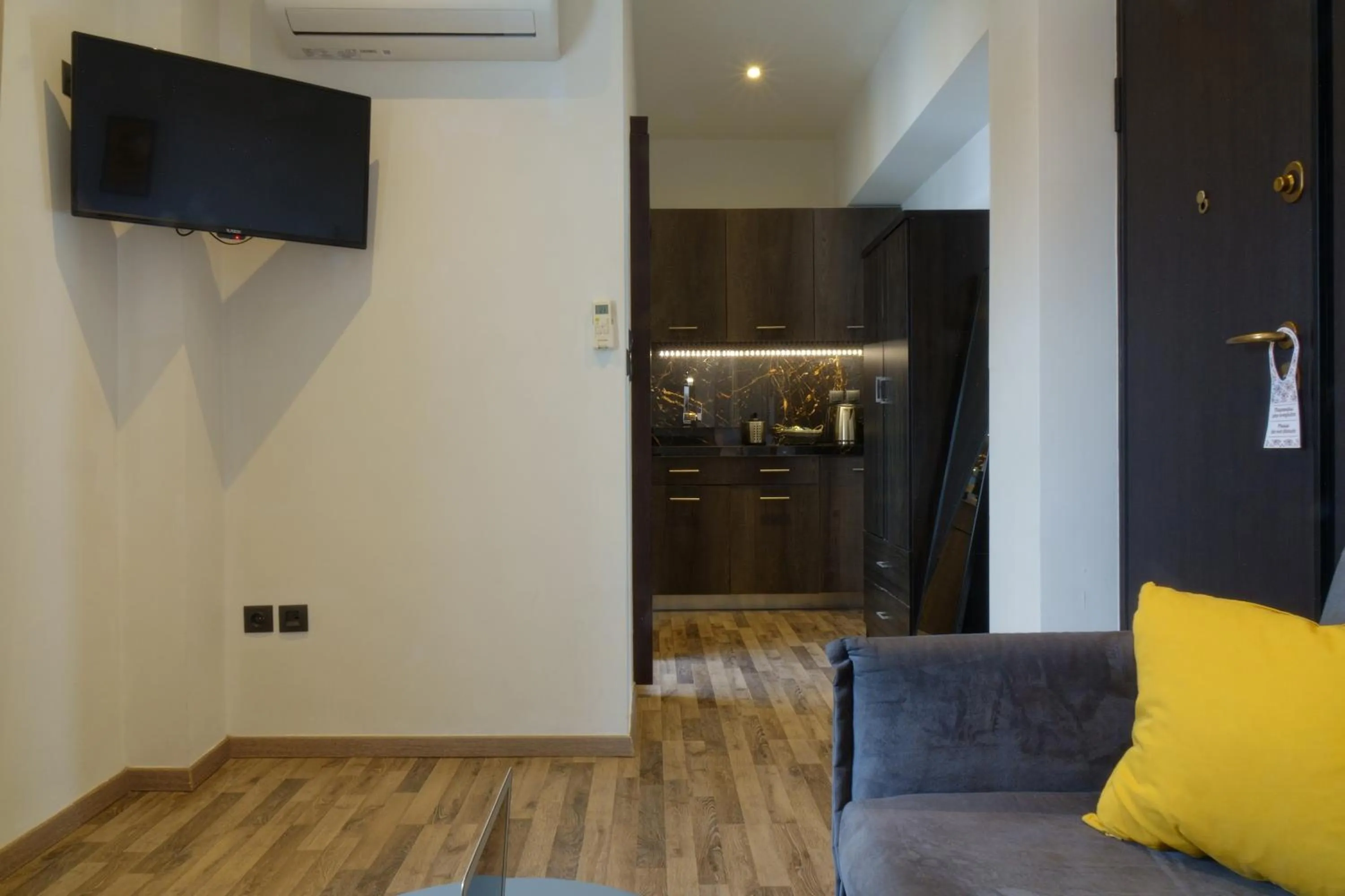 Seating area in The Athens Version Luxury Suites