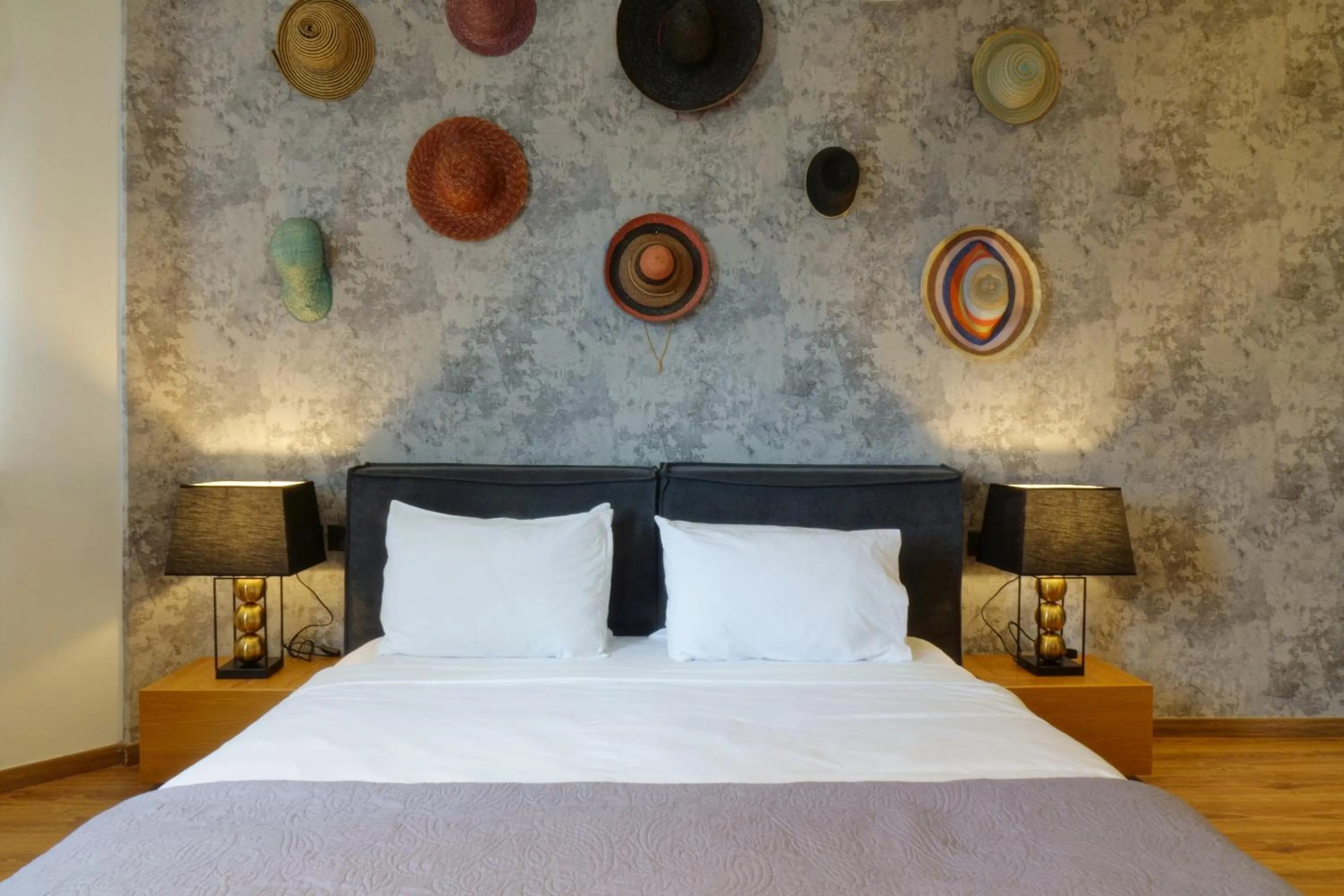 Bed in The Athens Version Luxury Suites