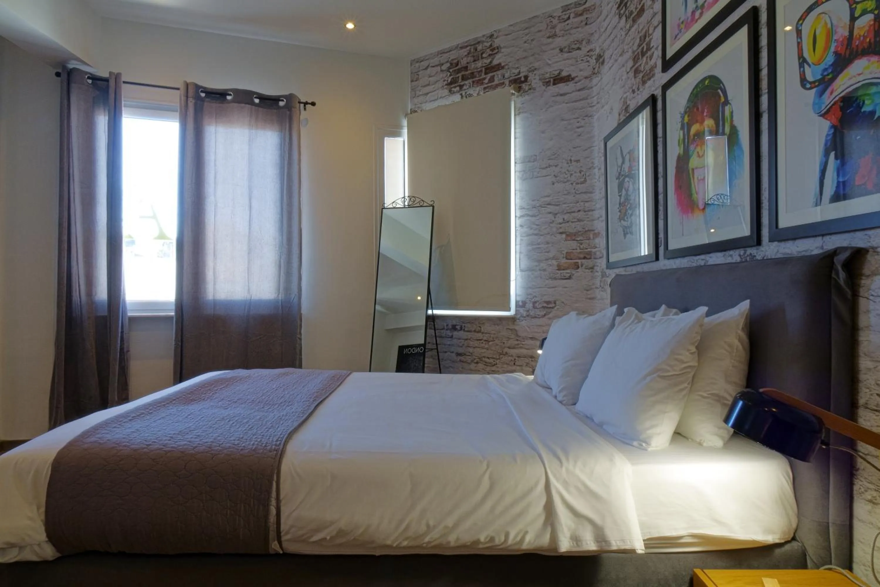 Bed in The Athens Version Luxury Suites