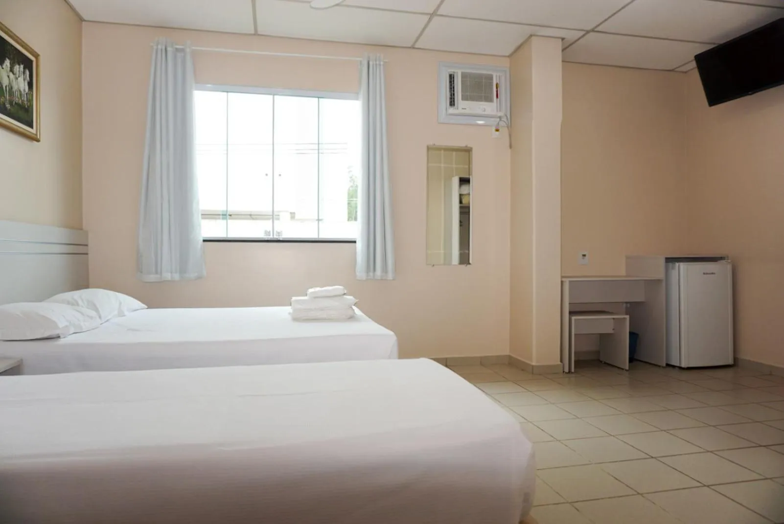 Bed in Lord Hotel Camburi