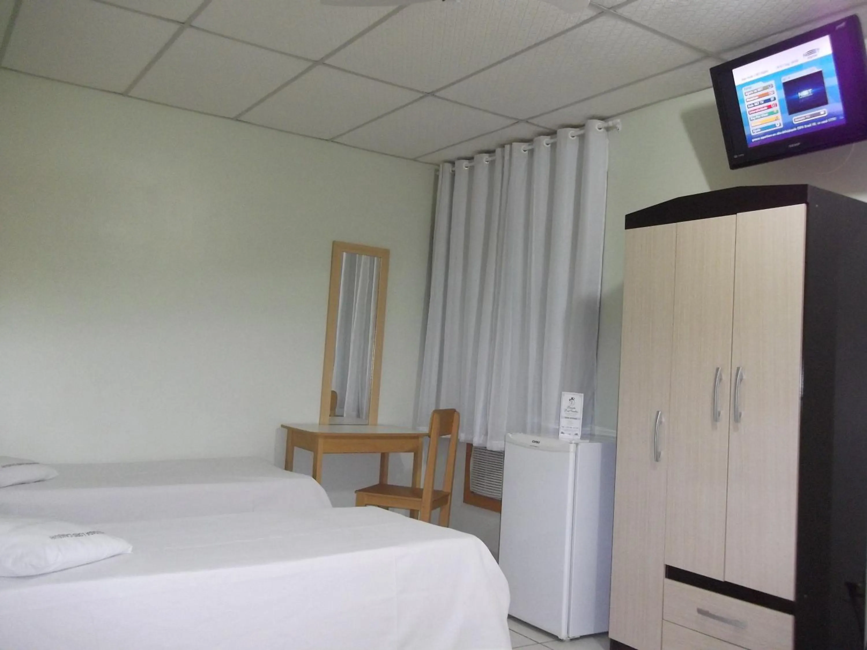 Bedroom, Bed in Lord Hotel Camburi