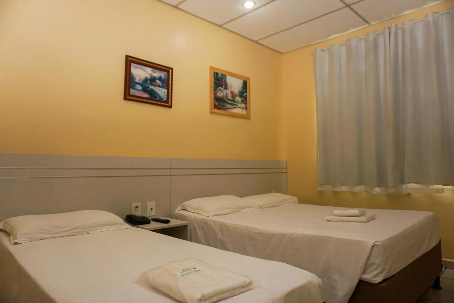 Bed in Lord Hotel Camburi
