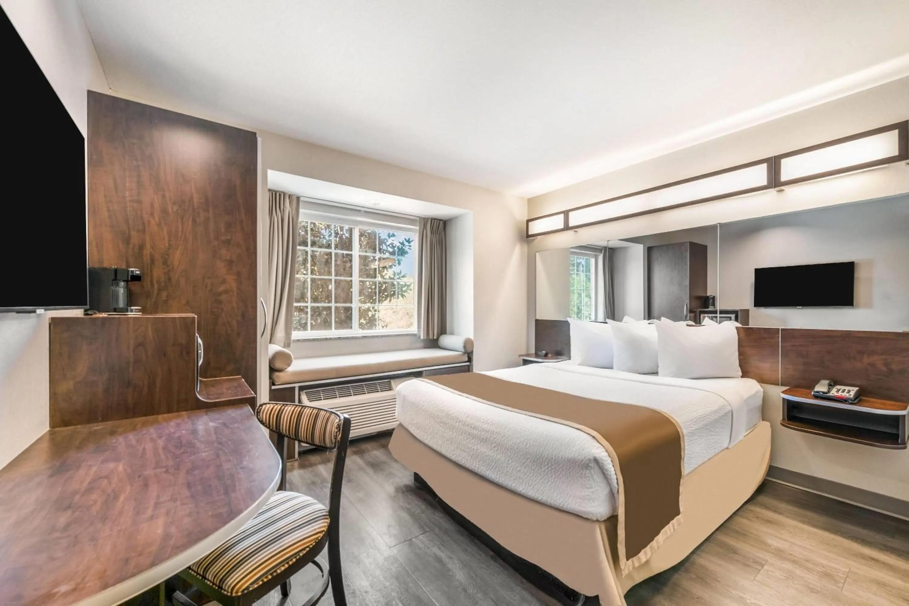 Bed in Microtel Inn & Suites by Wyndham Pearl River/Slidell