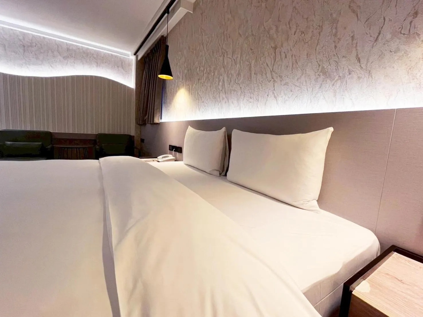 Bed in Dolamanco Hotel